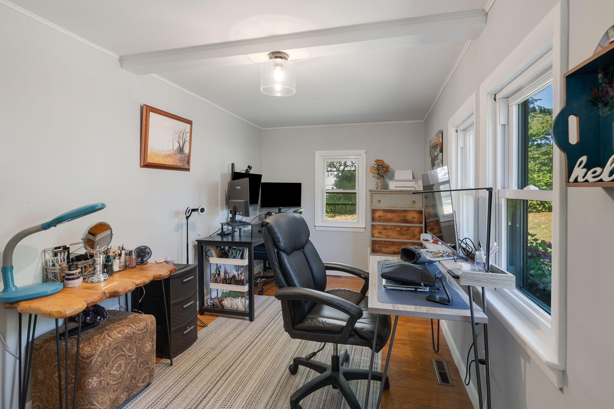 24 Butler Street Buzzards Bay, MA 02532 - Photo 19 of 37 a view of a workspace with furniture and a window