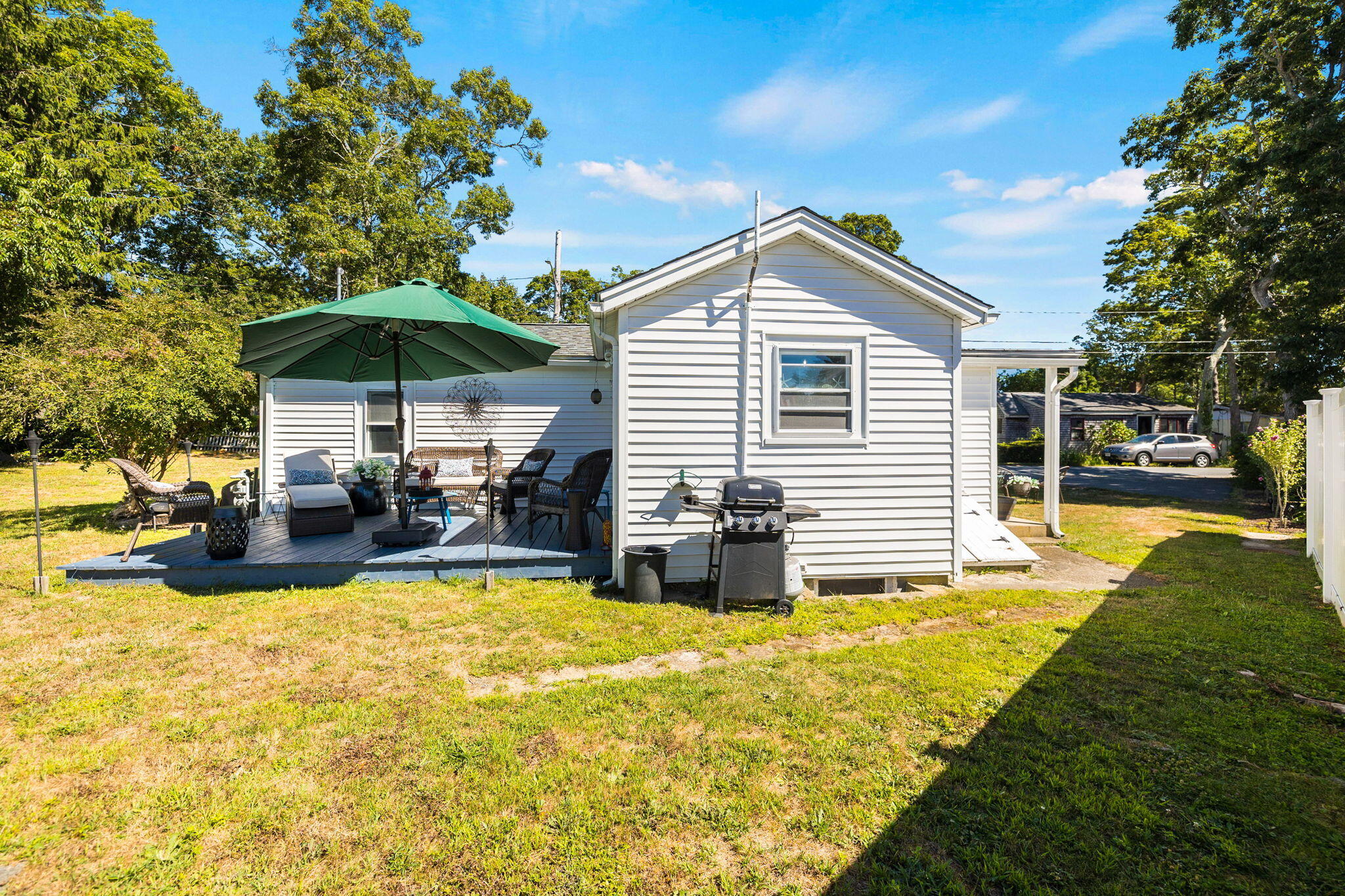 24 Butler Street Buzzards Bay, MA 02532 - Photo 21 of 37 a view of a house with swimming pool and sitting area