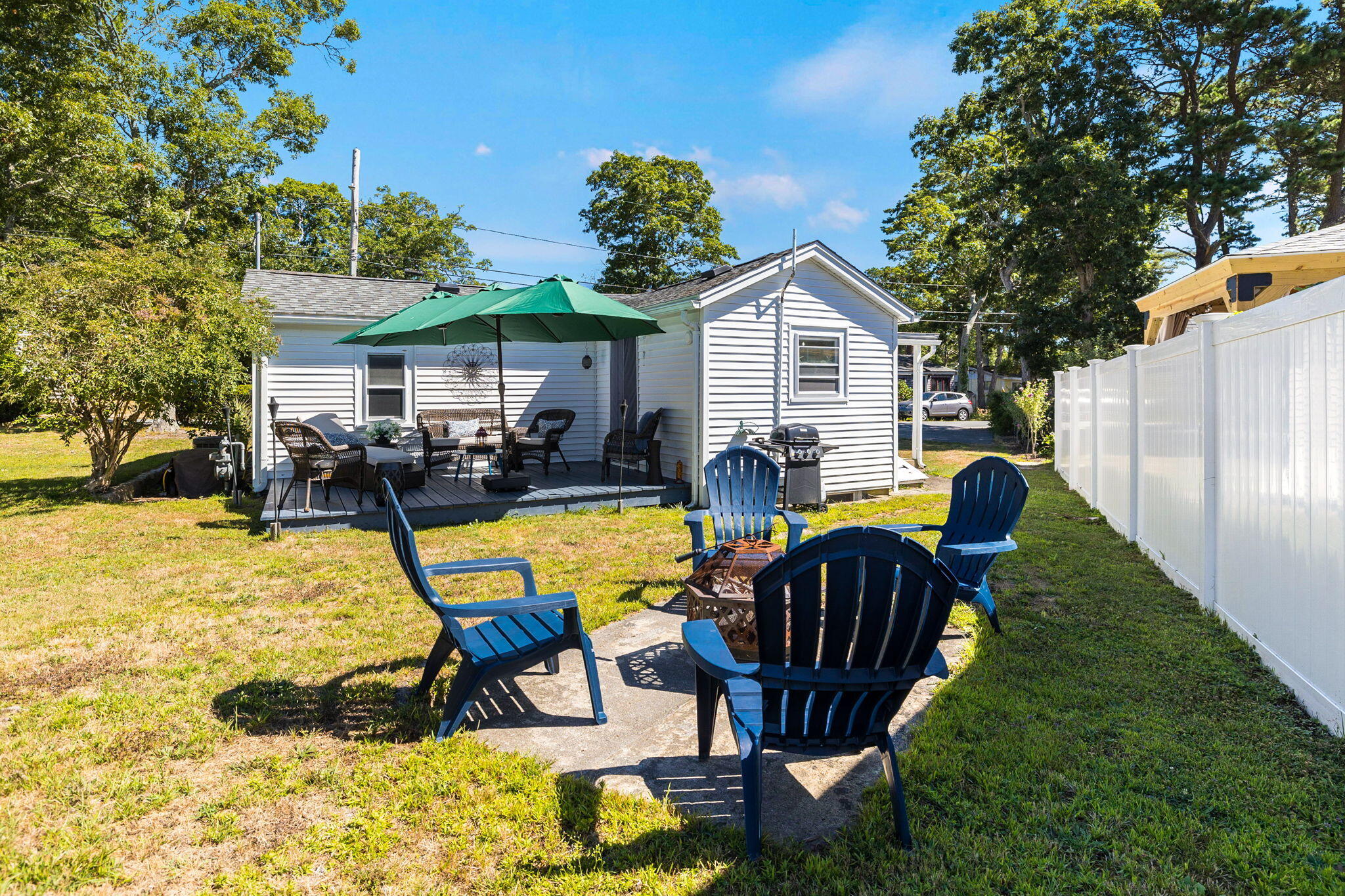 24 Butler Street Buzzards Bay, MA 02532 - Photo 23 of 37 a view of a house with swimming pool and sitting area