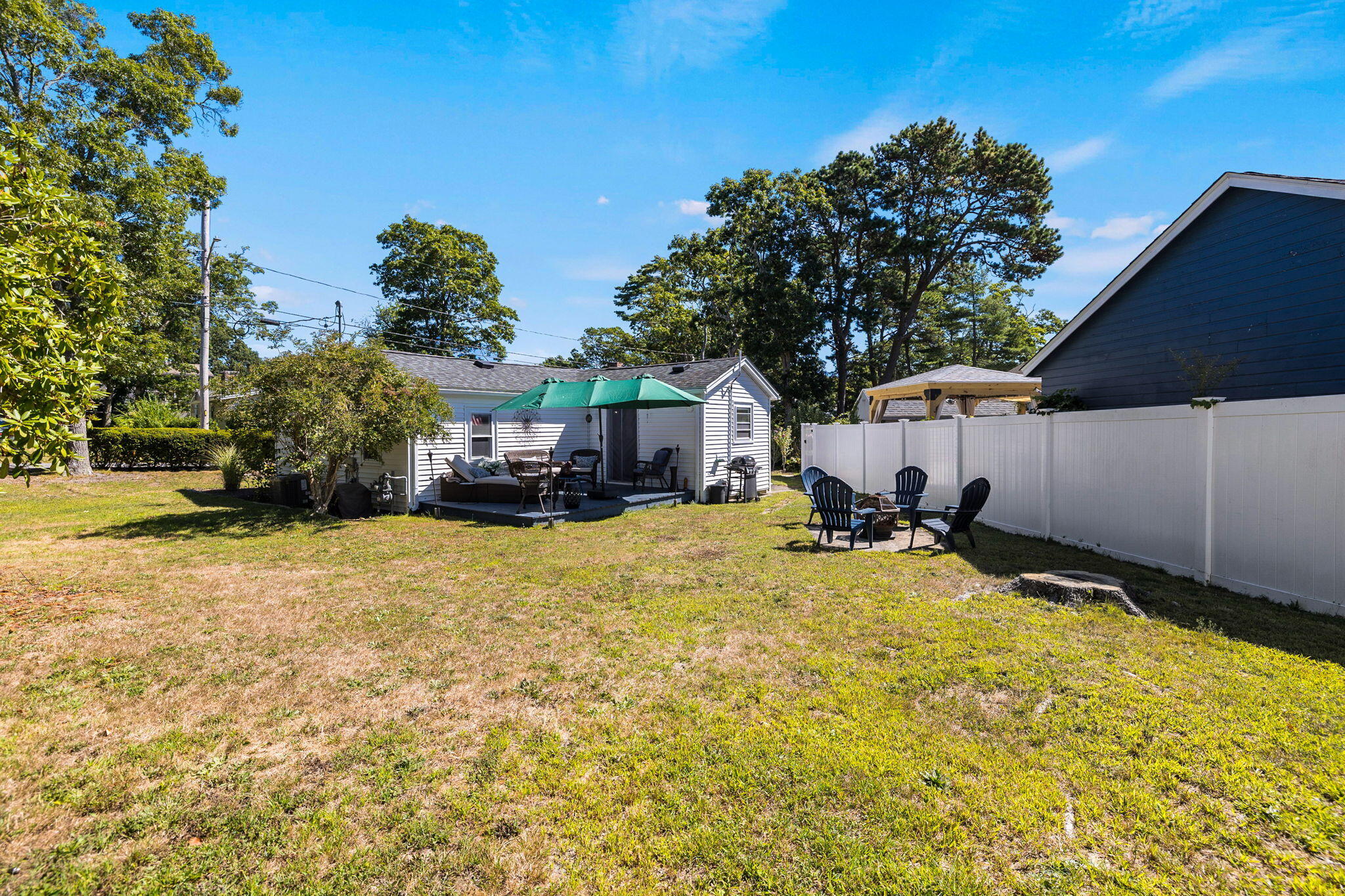 24 Butler Street Buzzards Bay, MA 02532 - Photo 25 of 37 a house view with a swimming pool