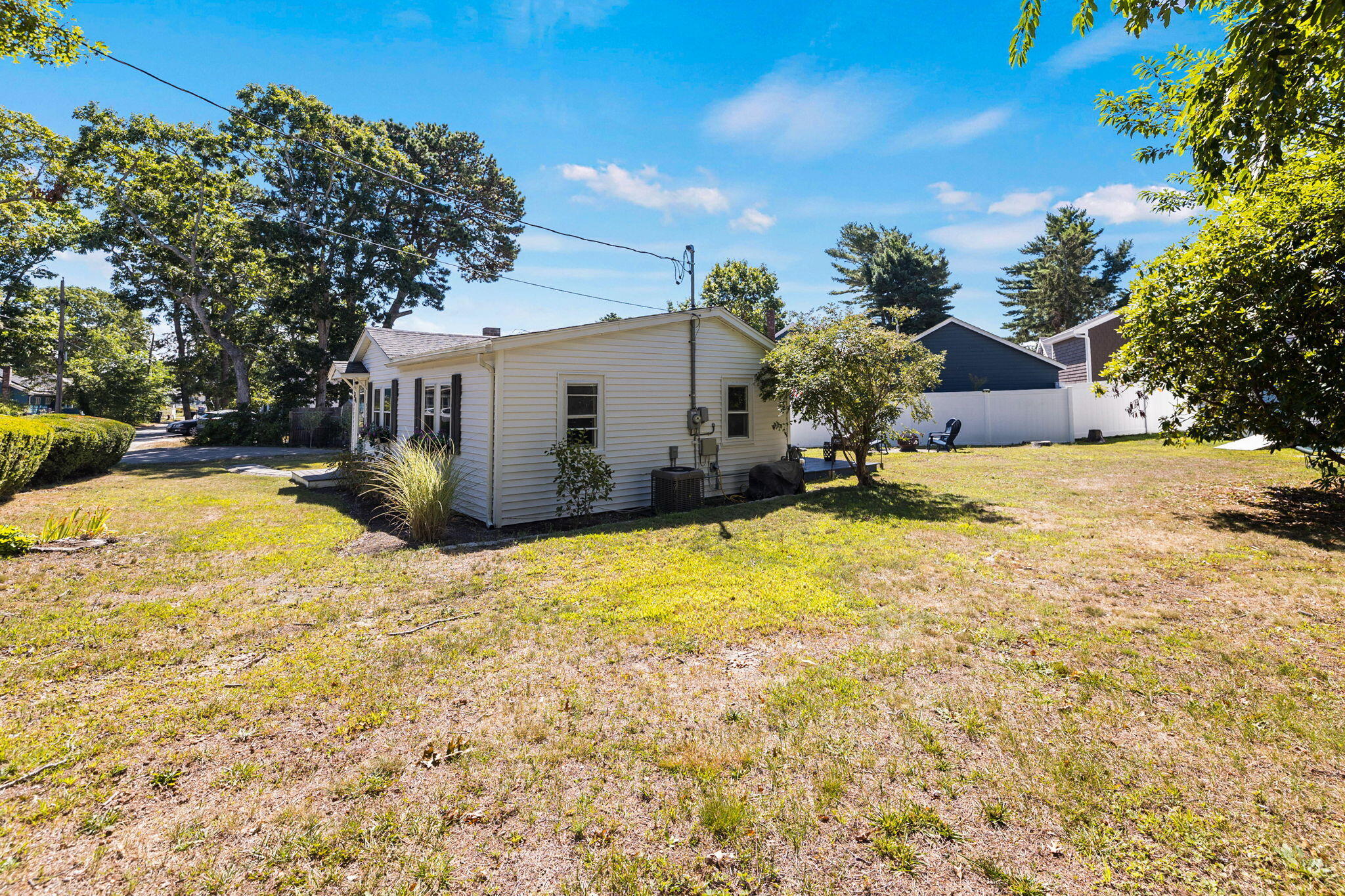 24 Butler Street Buzzards Bay, MA 02532 - Photo 28 of 37 a view of a house with a yard