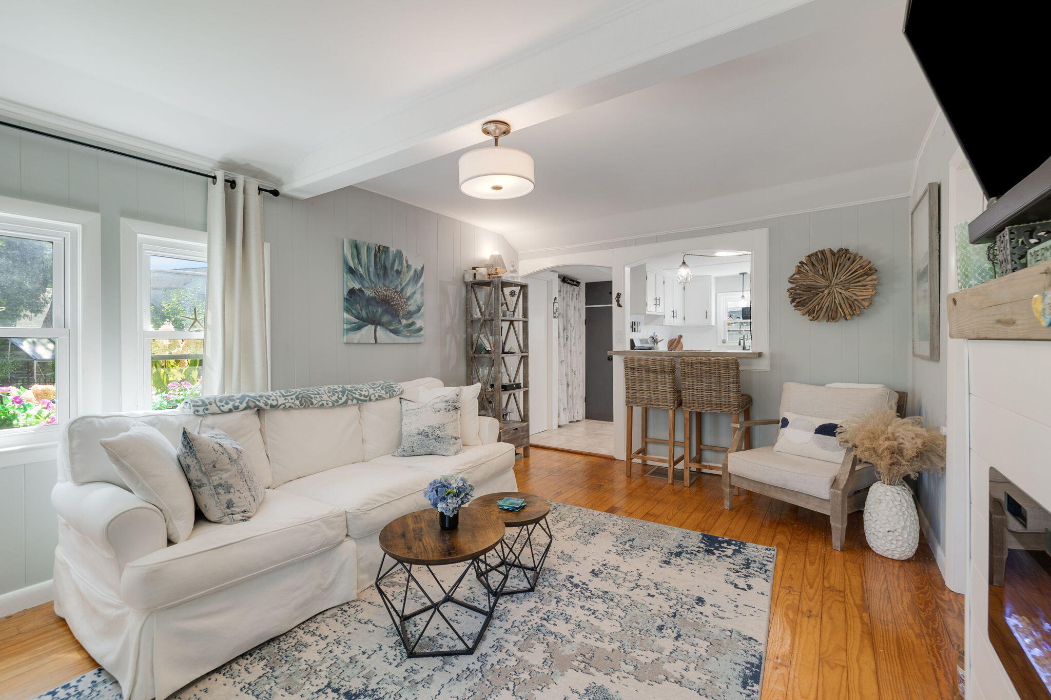 24 Butler Street Buzzards Bay, MA 02532 - Photo 6 of 37 a living room with furniture and wooden floor