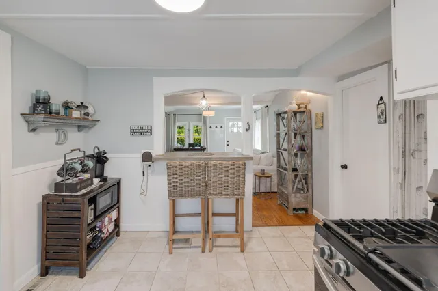 a bedroom with furniture and a window