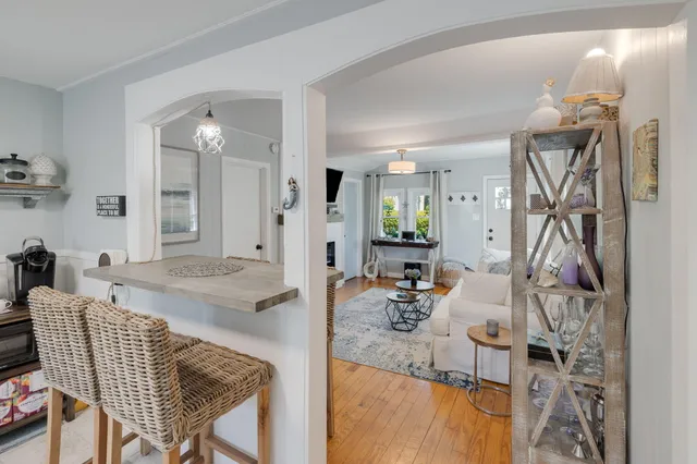 a living room with furniture and a table