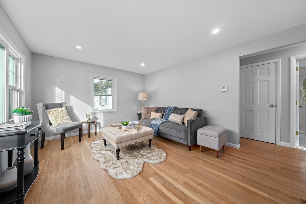 14 Curtis Road Canton, MA 02021 - Photo 11 of 23 a living room with furniture and a wooden floor