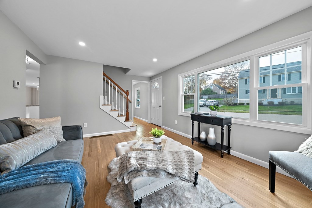 14 Curtis Road Canton, MA 02021 - Photo 12 of 23 a living room with furniture and a wooden floor