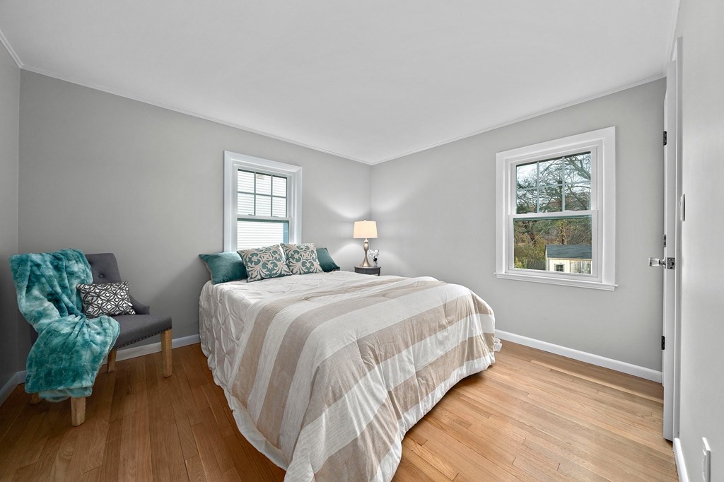 14 Curtis Road Canton, MA 02021 - Photo 13 of 23 a bedroom with a bed and window