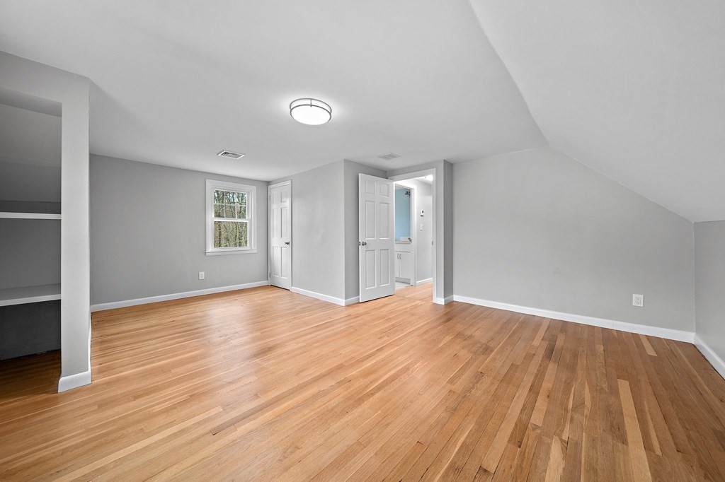 14 Curtis Road Canton, MA 02021 - Photo 15 of 23 an empty room with wooden floor and windows