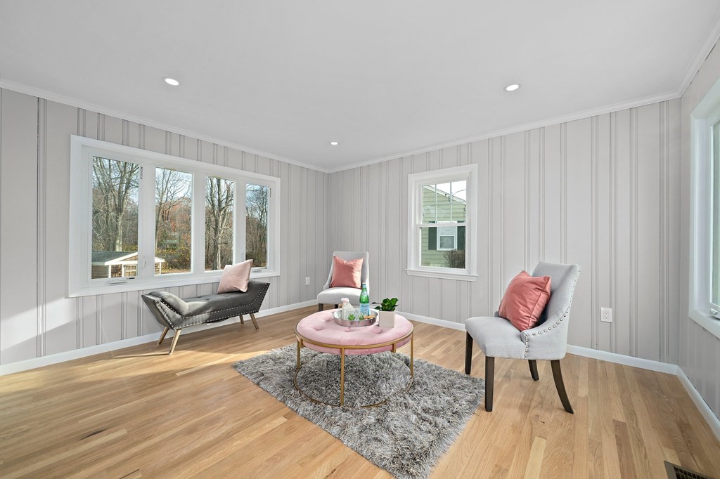 14 Curtis Road Canton, MA 02021 - Photo 7 of 23 a living room with furniture and a window