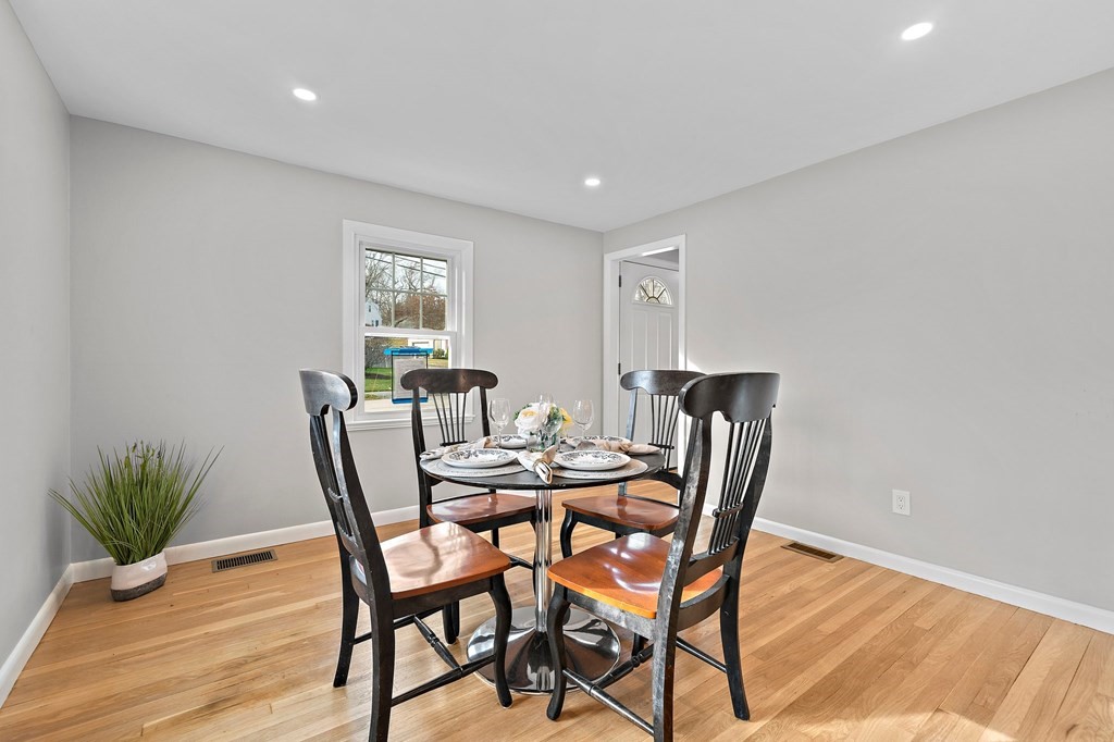 14 Curtis Road Canton, MA 02021 - Photo 9 of 23 a view of a dining room with furniture and wooden floor