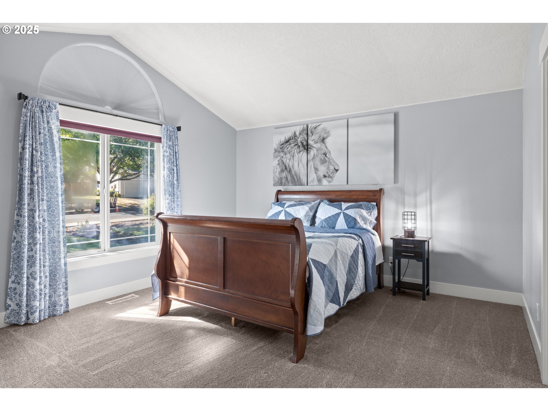 7243 Southwest Applegate Drive Beaverton, OR 97007 - Photo 13 of 39 a bedroom with a bed and a large window