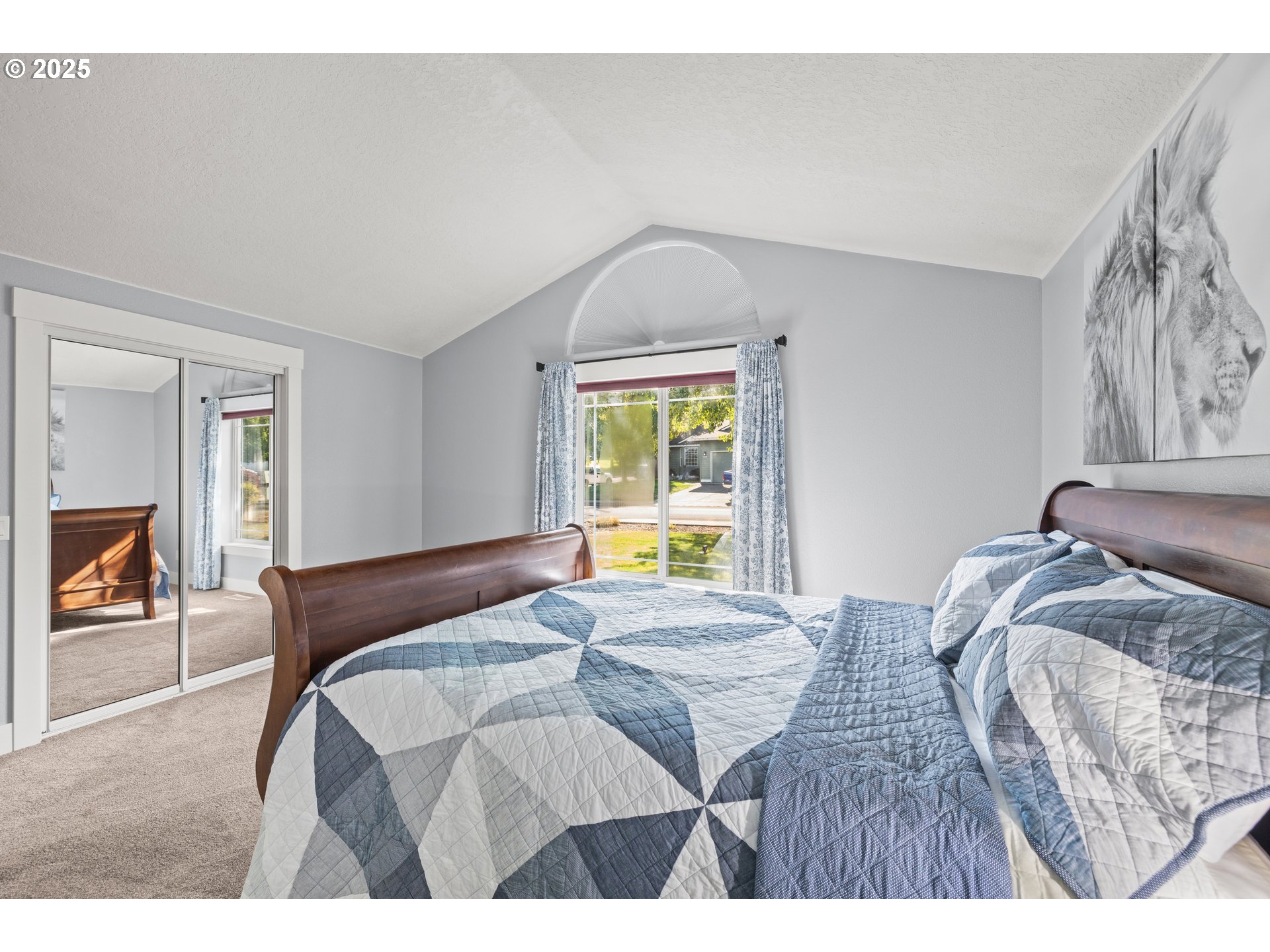 7243 Southwest Applegate Drive Beaverton, OR 97007 - Photo 16 of 39 a bedroom with a bed and a painting on the wall