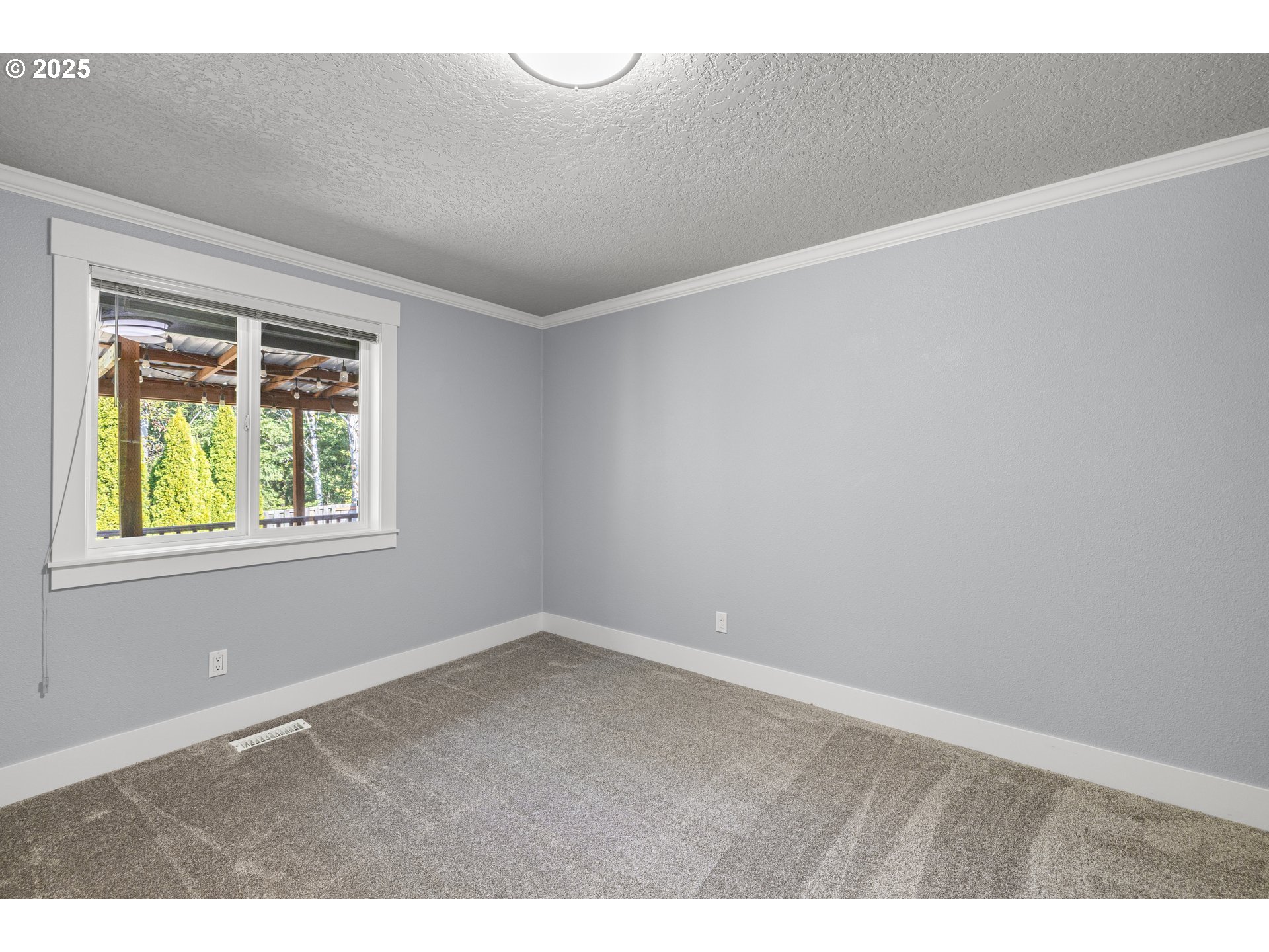 7243 Southwest Applegate Drive Beaverton, OR 97007 - Photo 20 of 39 a view of an empty room with a window