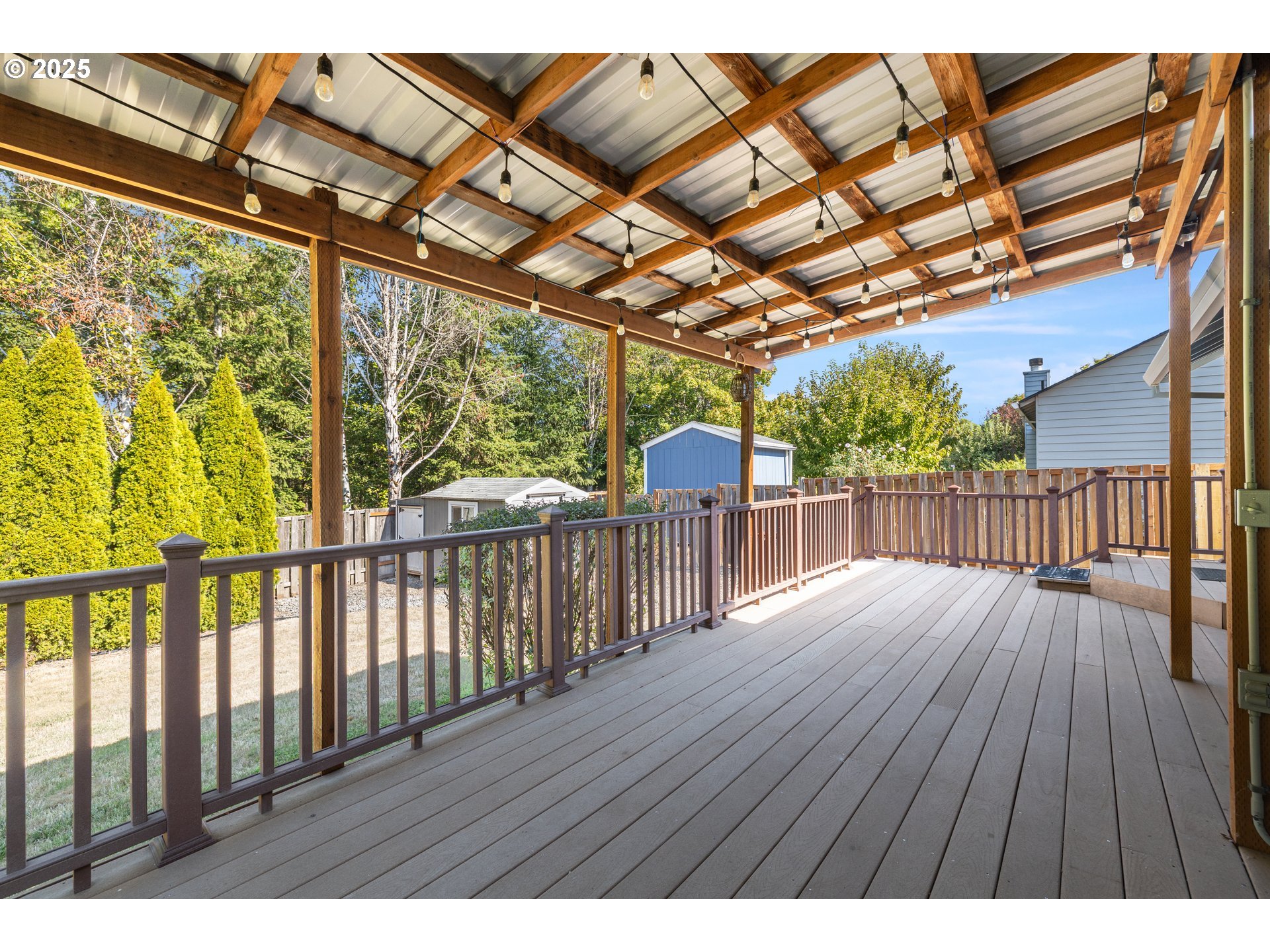 7243 Southwest Applegate Drive Beaverton, OR 97007 - Photo 28 of 39 a view of porch with wooden floor