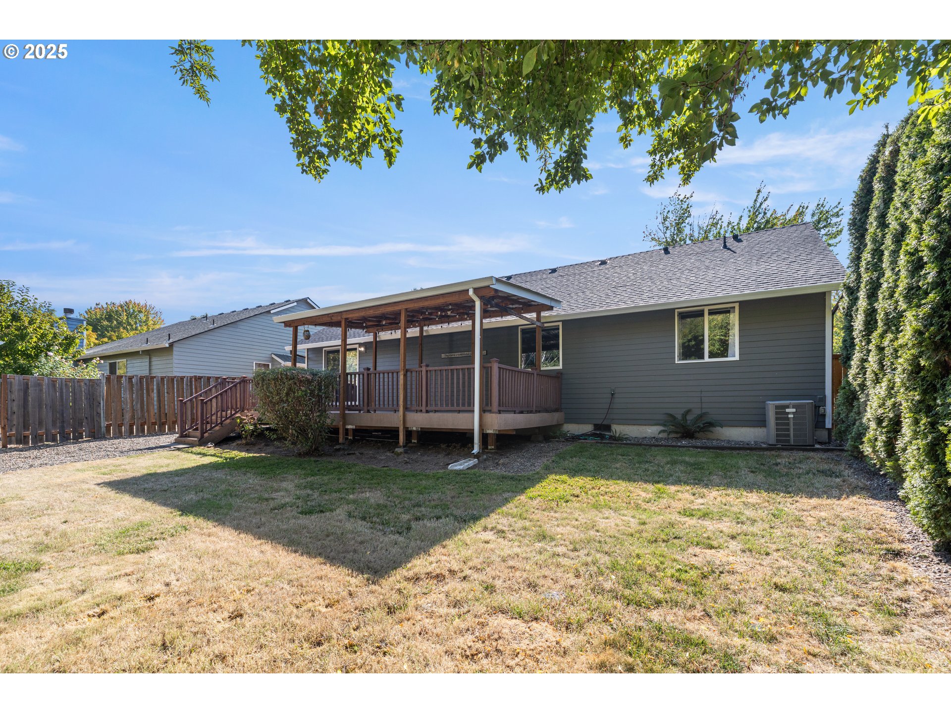 7243 Southwest Applegate Drive Beaverton, OR 97007 - Photo 30 of 39 a view of a house with a yard