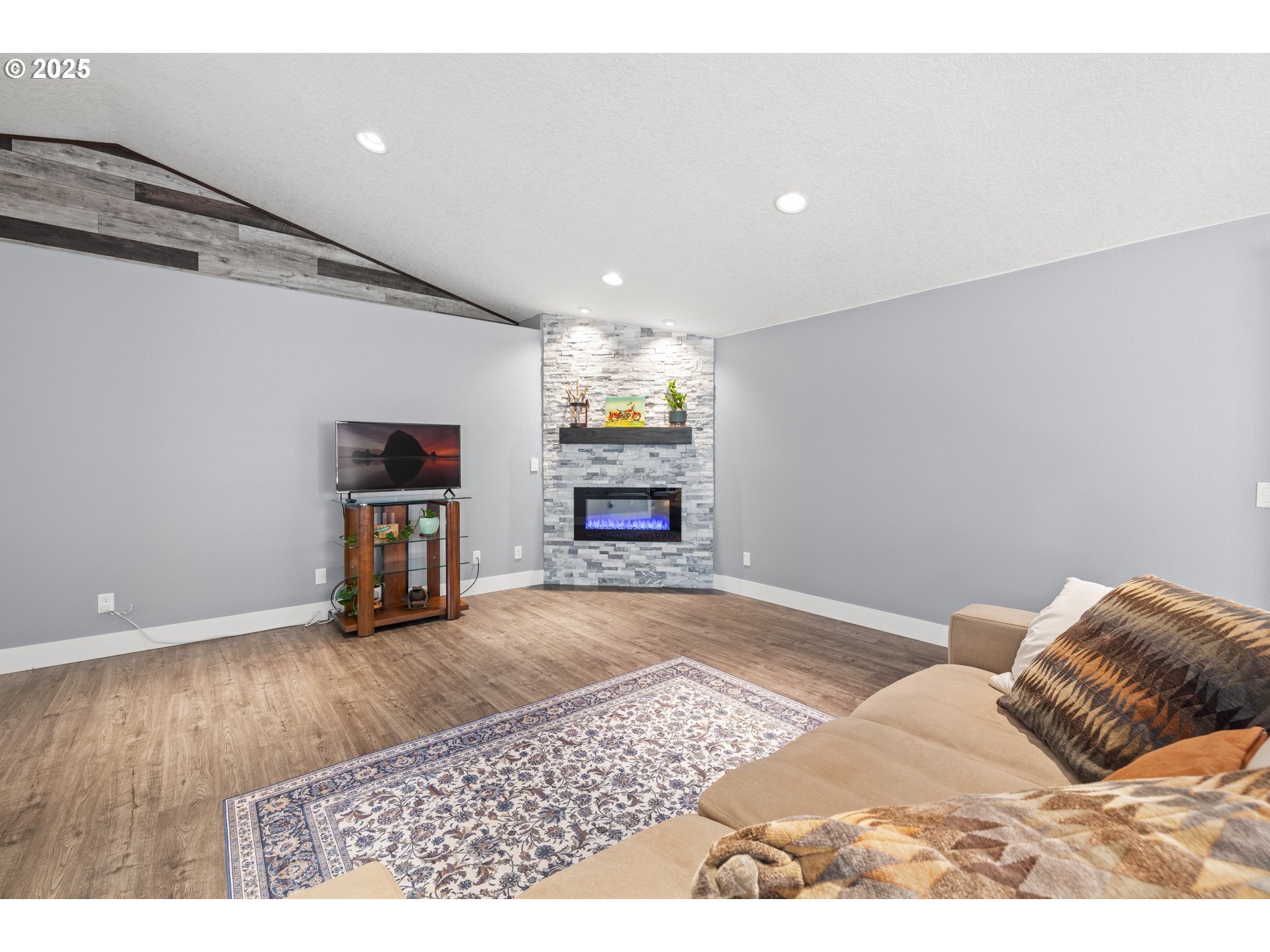 7243 Southwest Applegate Drive Beaverton, OR 97007 - Photo 5 of 39 a bedroom with a bed and a television