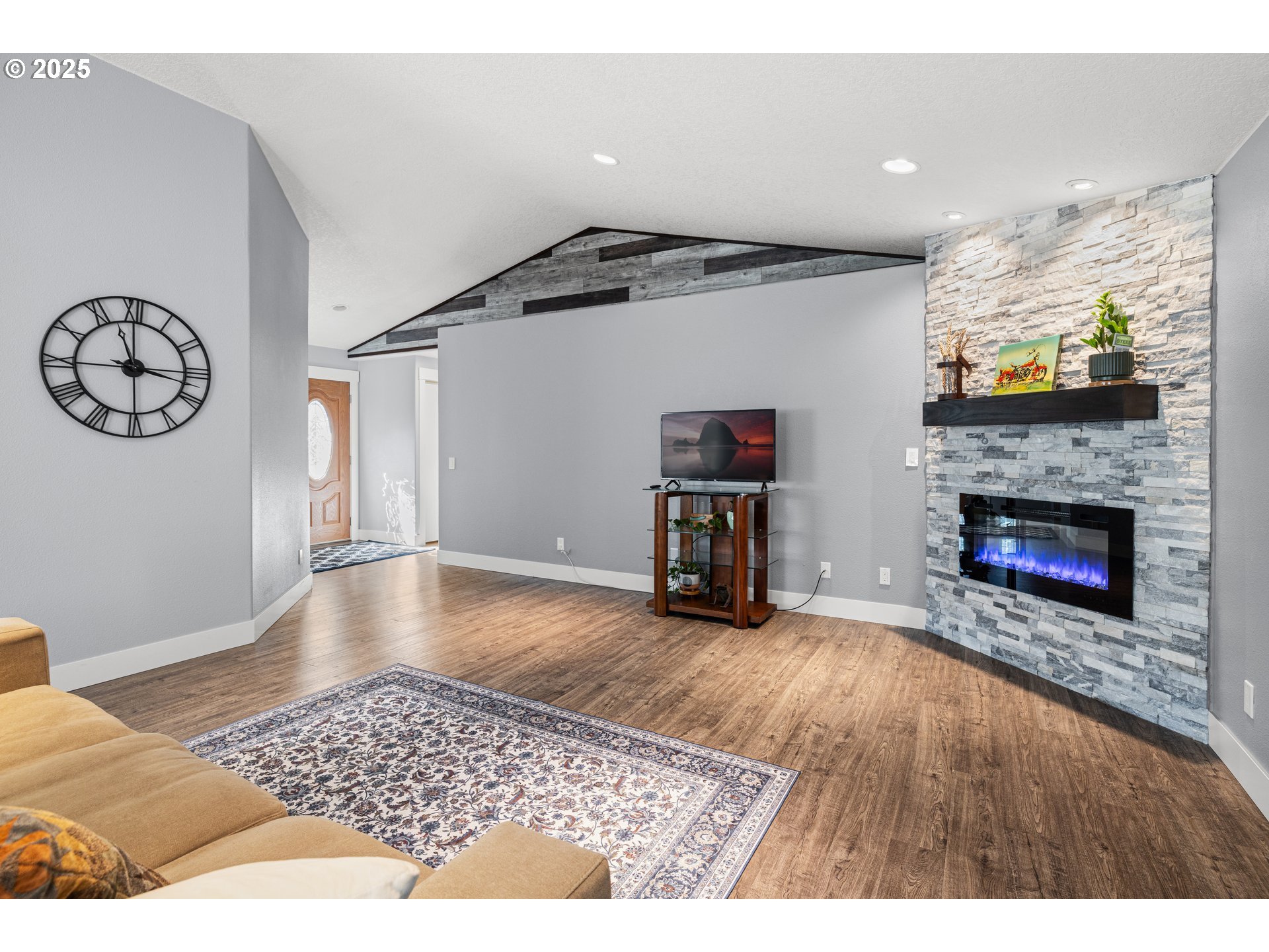7243 Southwest Applegate Drive Beaverton, OR 97007 - Photo 6 of 39 a living room with furniture and a fireplace
