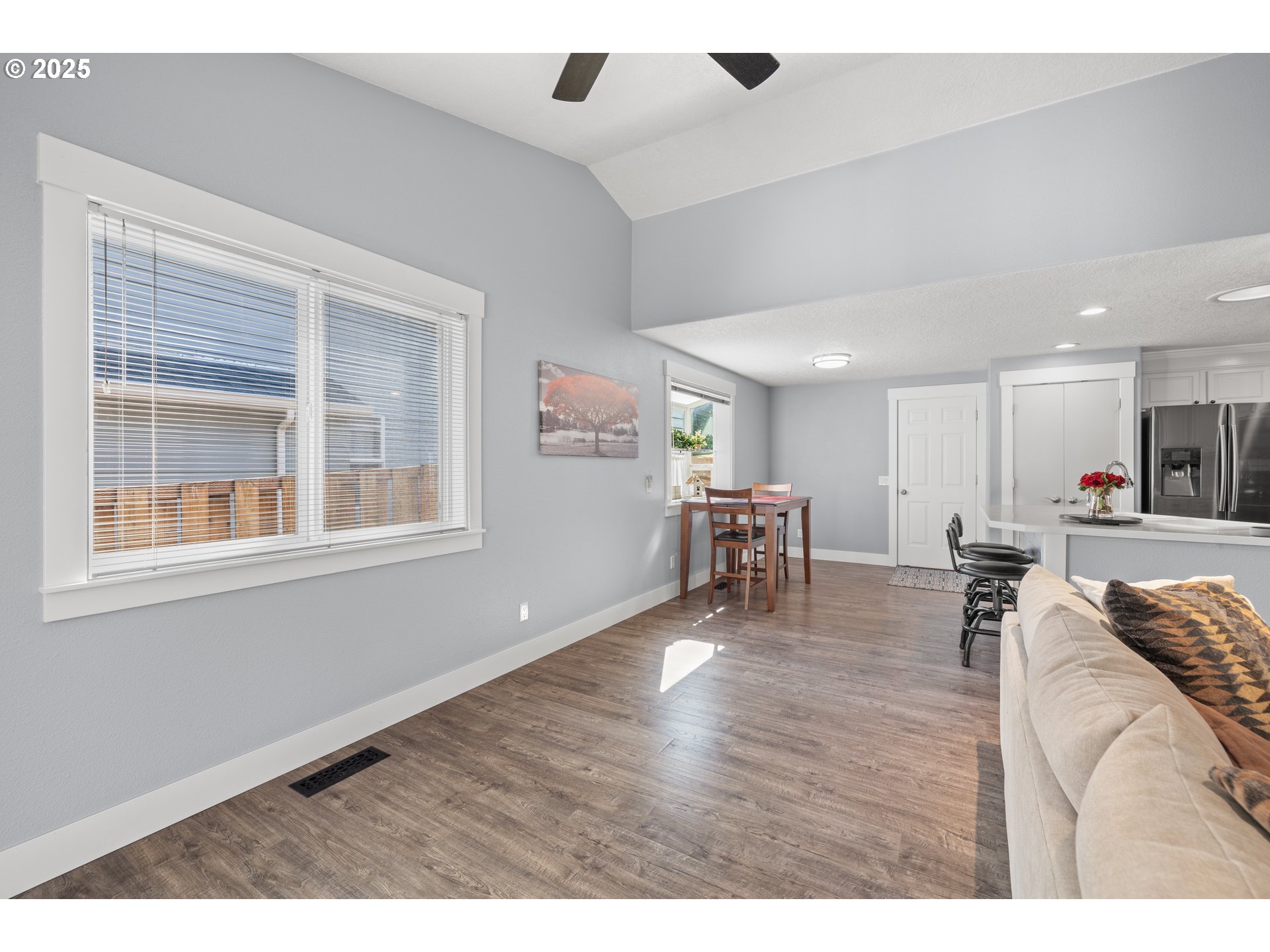 7243 Southwest Applegate Drive Beaverton, OR 97007 - Photo 8 of 39 a living room with furniture and a large window