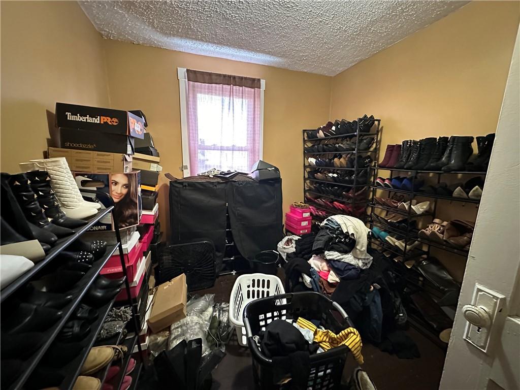 544 Woodward Avenue McKees Rocks, PA 15136 - Photo 8 of 13 a room with lots of stuff and furniture