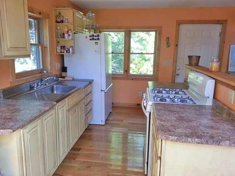 54 Grapevine Brook Road Dover-Foxcroft, ME 04426 - Photo 9 of 30 Kitchen. stunning hardwood floors