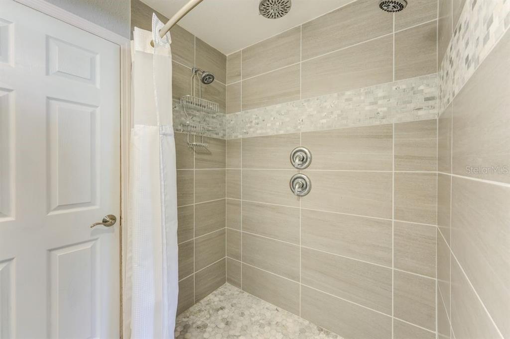 900 North Harbor Terrace Road Tavares, FL 32778 - Photo 16 of 58 a bathroom with a shower