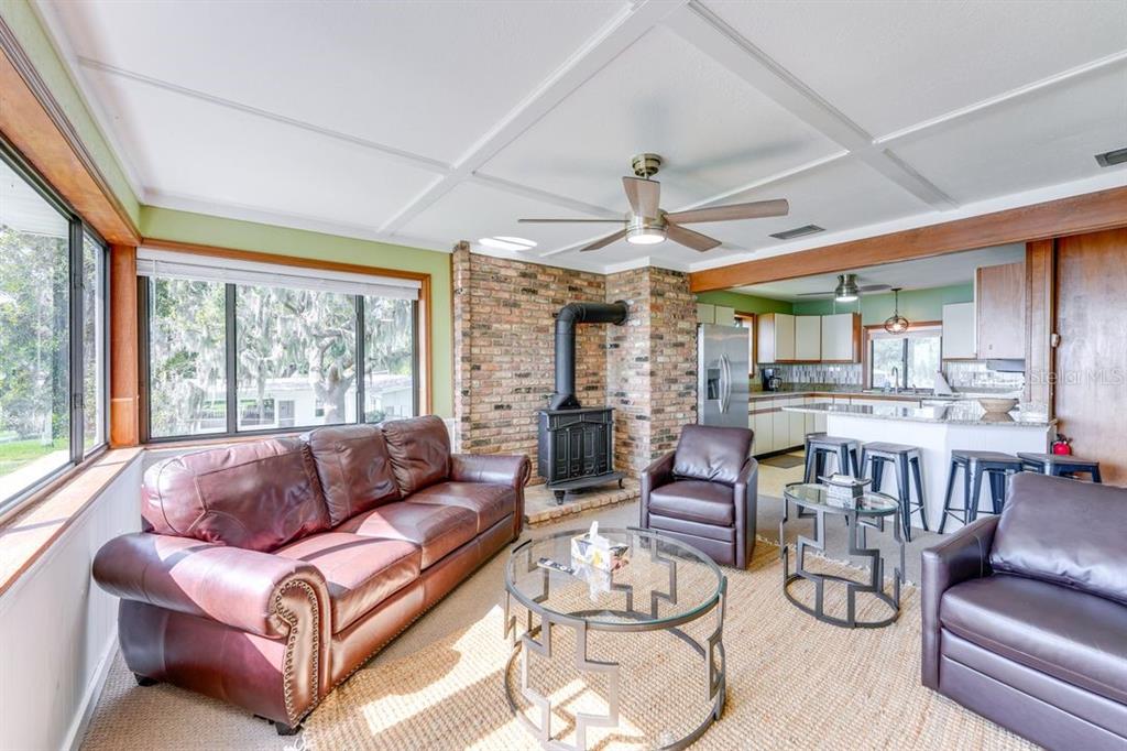900 North Harbor Terrace Road Tavares, FL 32778 - Photo 27 of 58 a living room with furniture and a large window