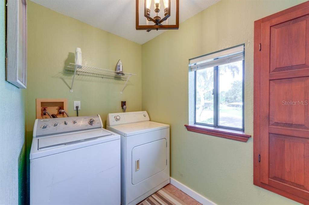 900 North Harbor Terrace Road Tavares, FL 32778 - Photo 36 of 58 a utility room with dryer and washer