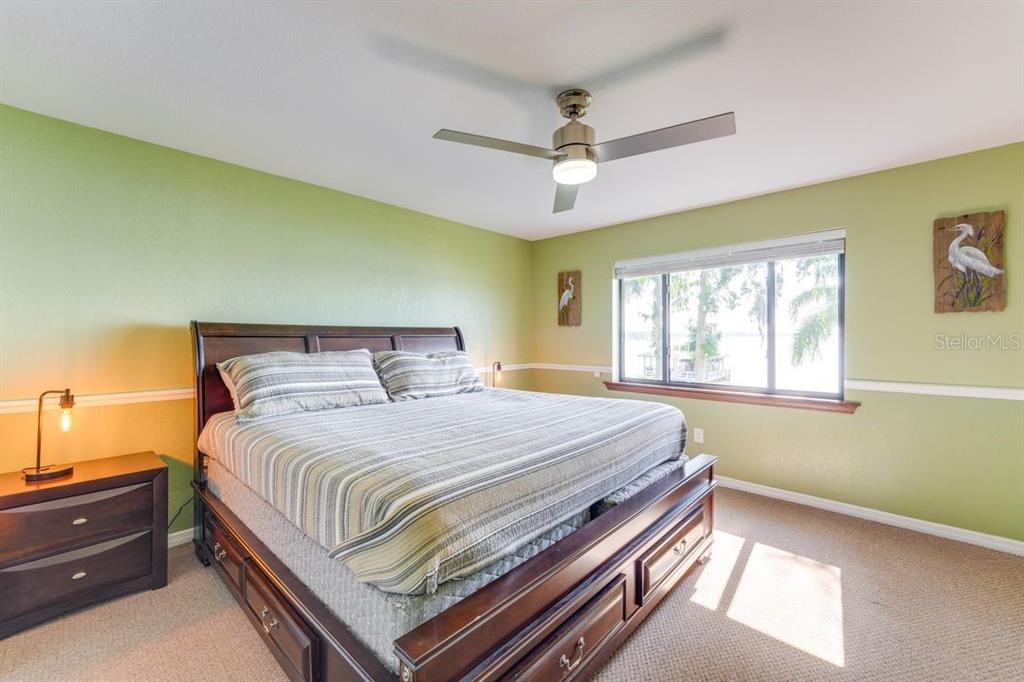 900 North Harbor Terrace Road Tavares, FL 32778 - Photo 41 of 58 a bedroom with a bed and window