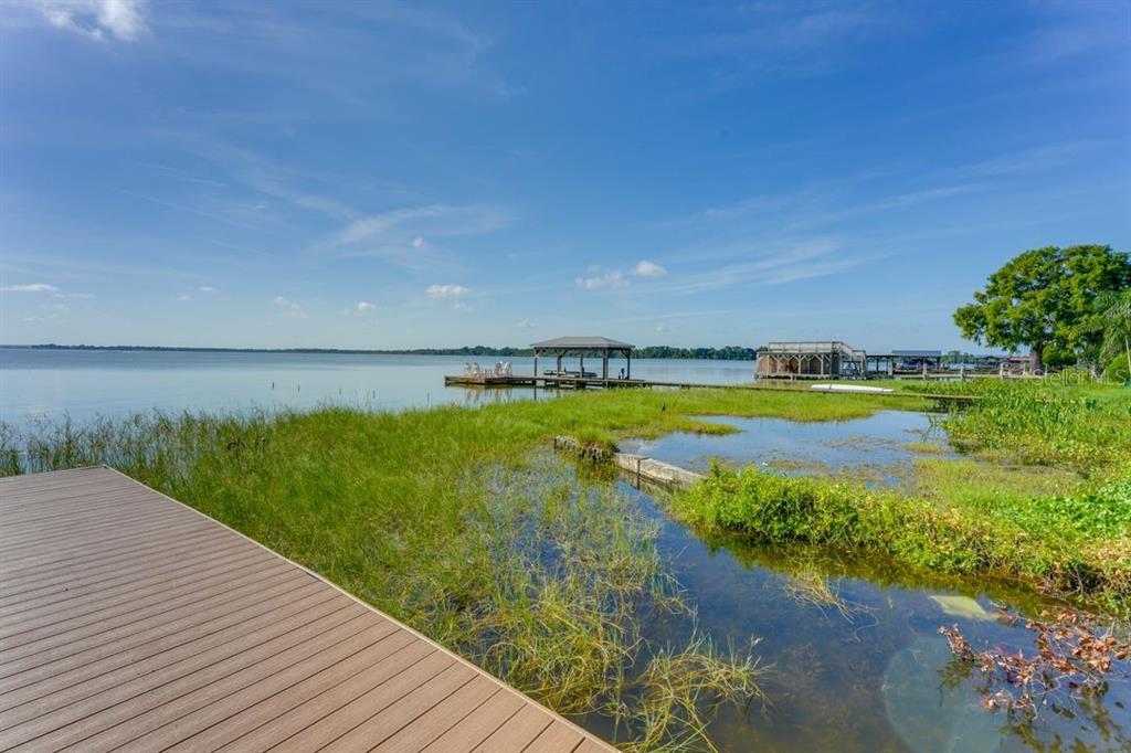 900 North Harbor Terrace Road Tavares, FL 32778 - Photo 57 of 58 a view of a lake with a big yard
