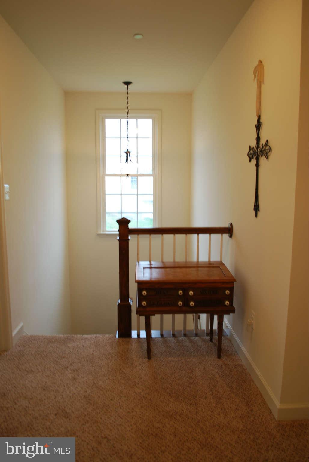 7209 Talbot Run Road Mount Airy, MD 21771 - Photo 13 of 25 a view of a room with a table and chairs