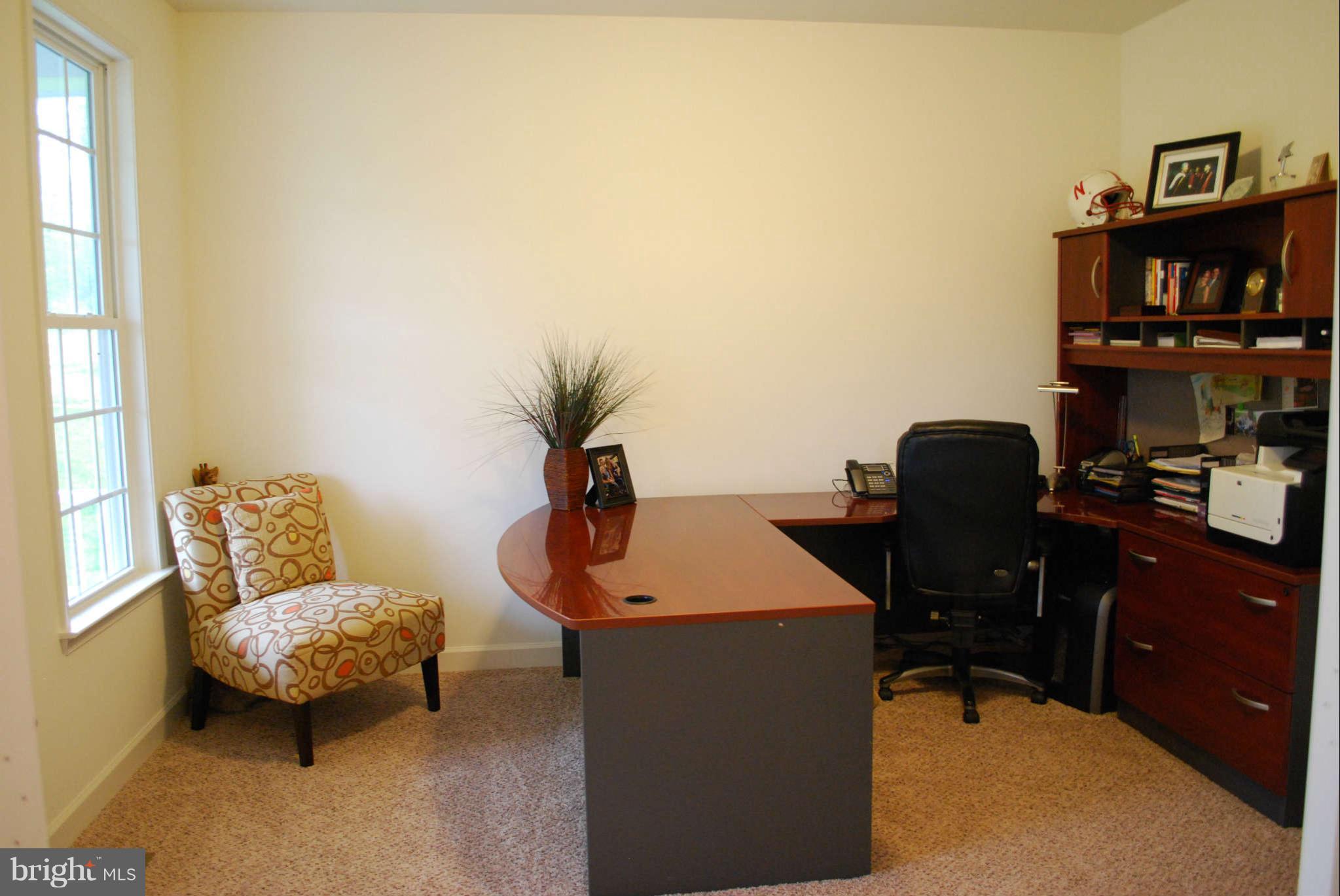 7209 Talbot Run Road Mount Airy, MD 21771 - Photo 4 of 25 a living room with furniture and a window