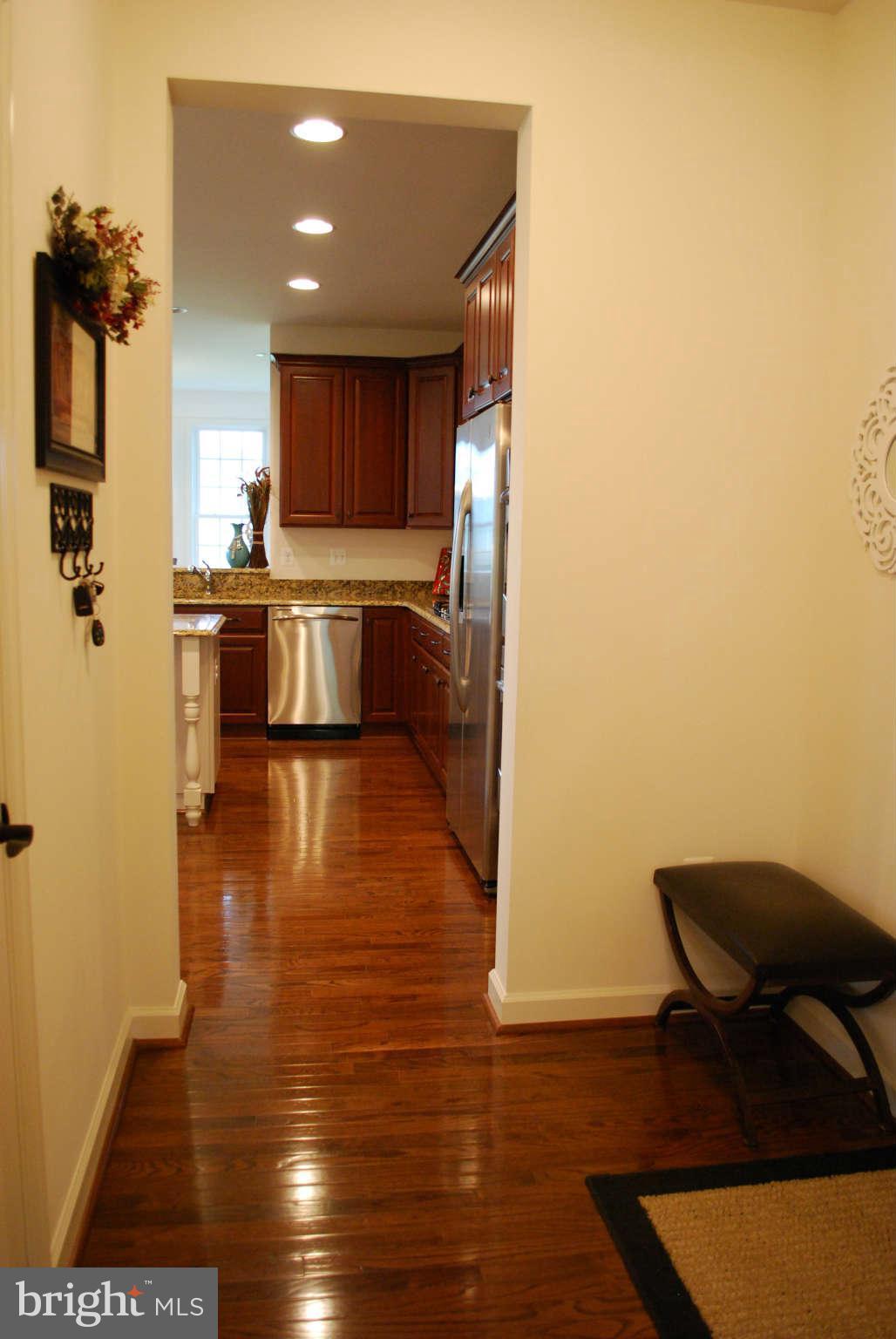 7209 Talbot Run Road Mount Airy, MD 21771 - Photo 6 of 25 a view of kitchen with cabinets and wooden floor
