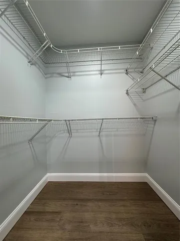 a bathroom with a sink a mirror and bathtub