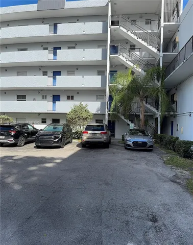 a view of car parked in front of building