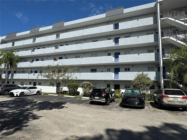a room with lots of table and chairs
