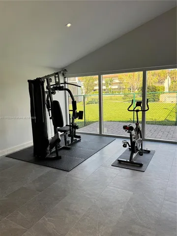 a view of a room with gym equipment