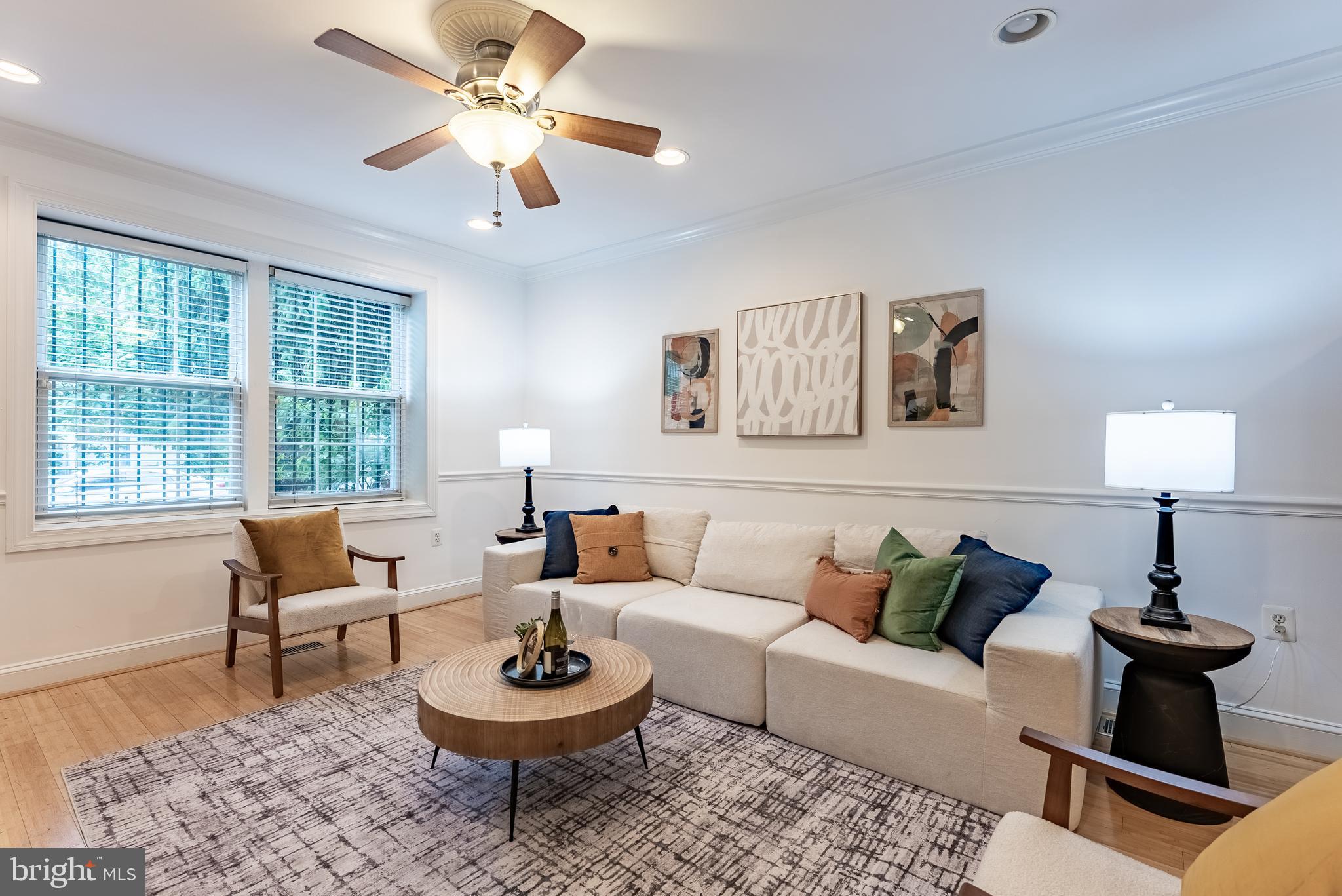 1840 D Street Northeast, Unit 1 Washington, DC 20002 - Photo 3 of 40 a living room with furniture and a window