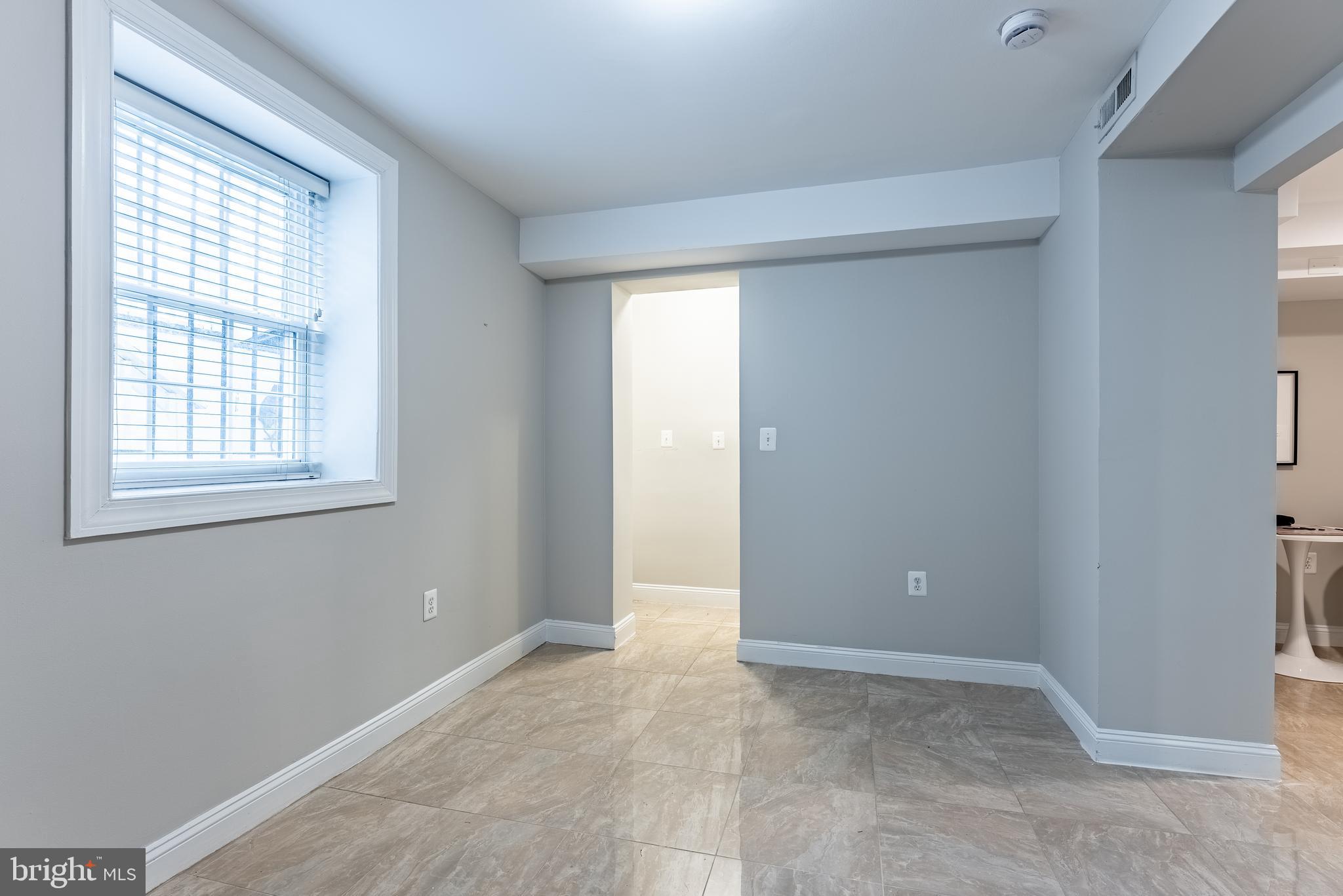 1840 D Street Northeast, Unit 1 Washington, DC 20002 - Photo 31 of 40 a view of an empty room with a window