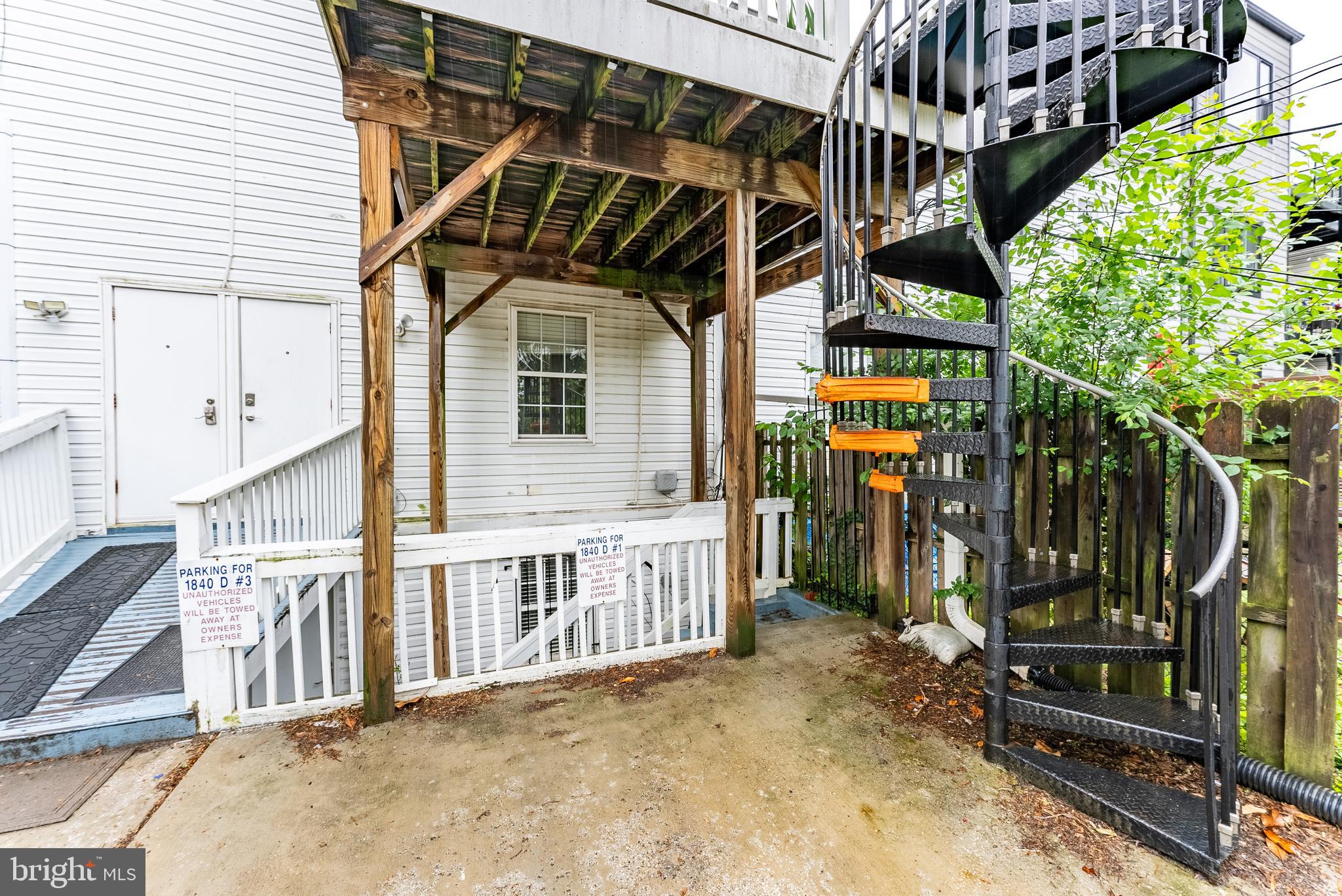 1840 D Street Northeast, Unit 1 Washington, DC 20002 - Photo 33 of 40 a view of front door and small yard