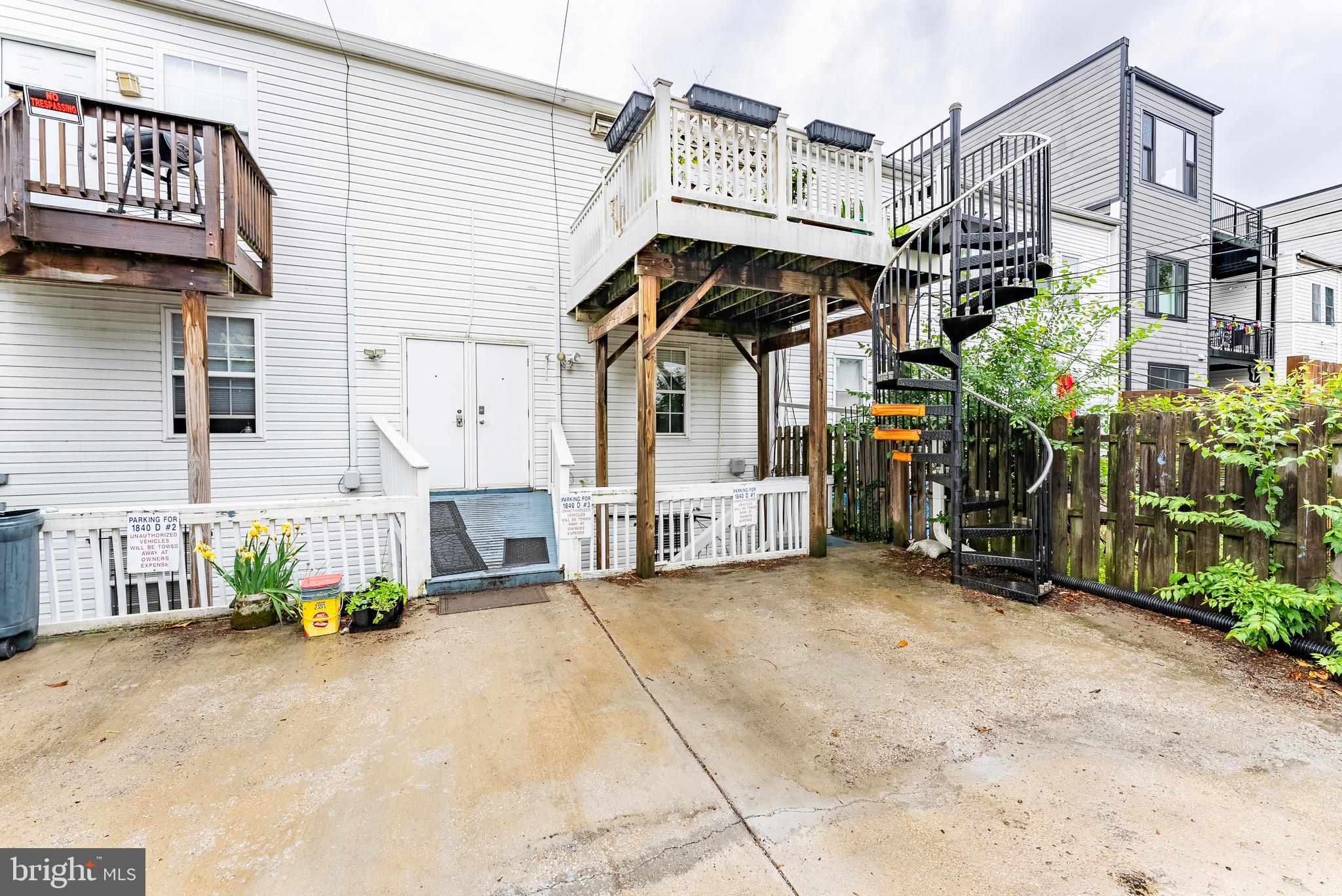 1840 D Street Northeast, Unit 1 Washington, DC 20002 - Photo 34 of 40 a view of a house with large trees