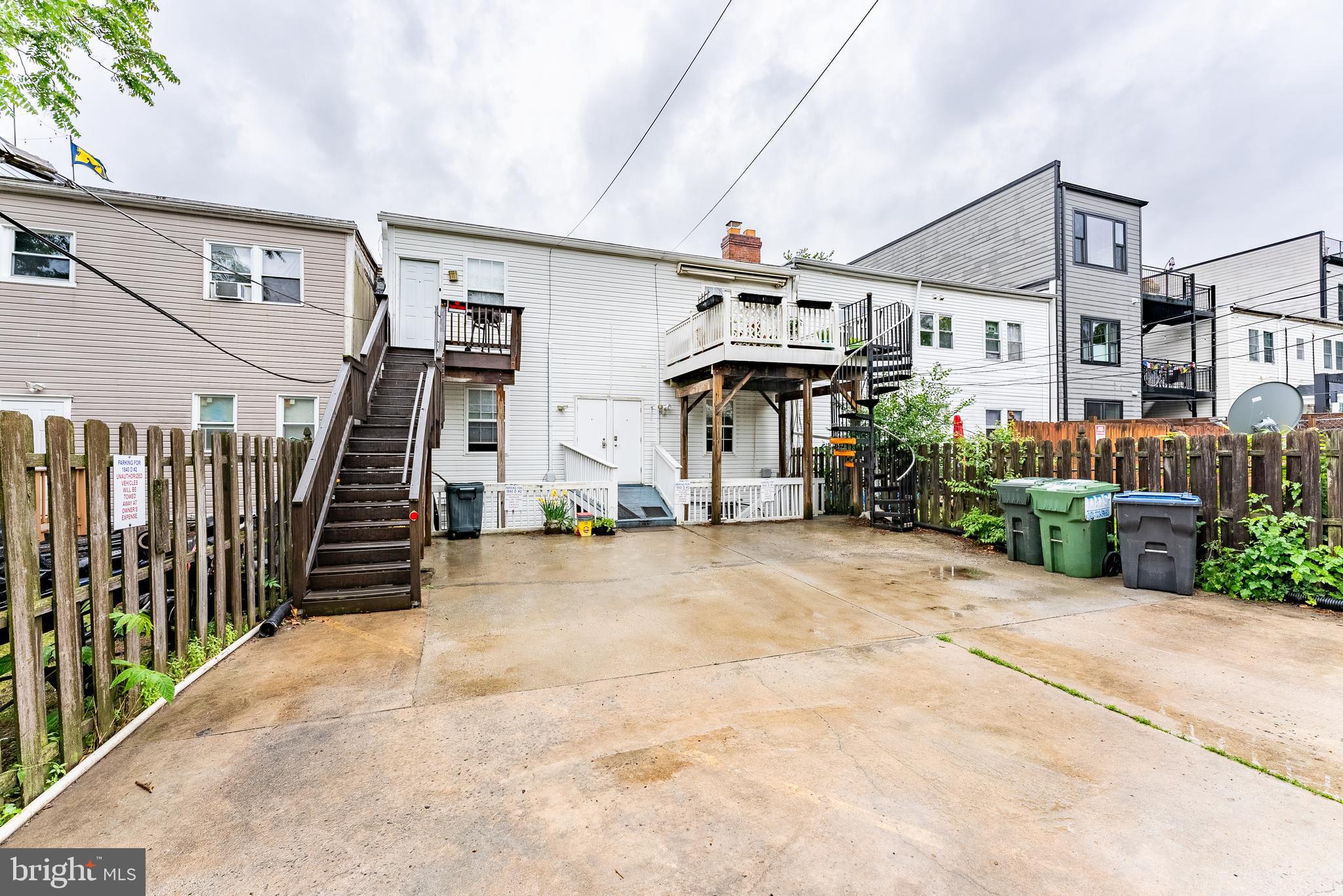 1840 D Street Northeast, Unit 1 Washington, DC 20002 - Photo 35 of 40 a view of a house with wooden stairs