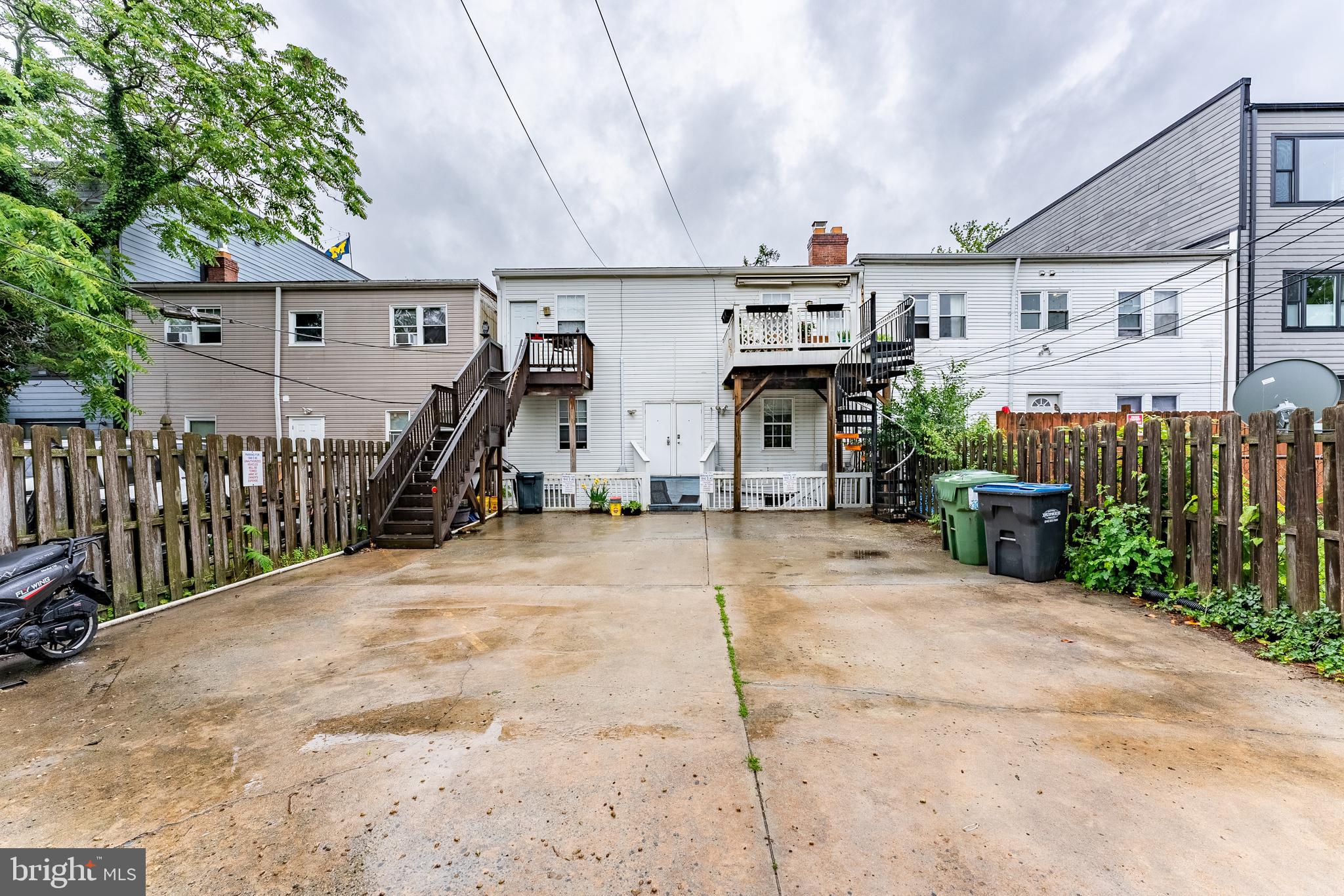 1840 D Street Northeast, Unit 1 Washington, DC 20002 - Photo 36 of 40 a view of a house with wooden stairs