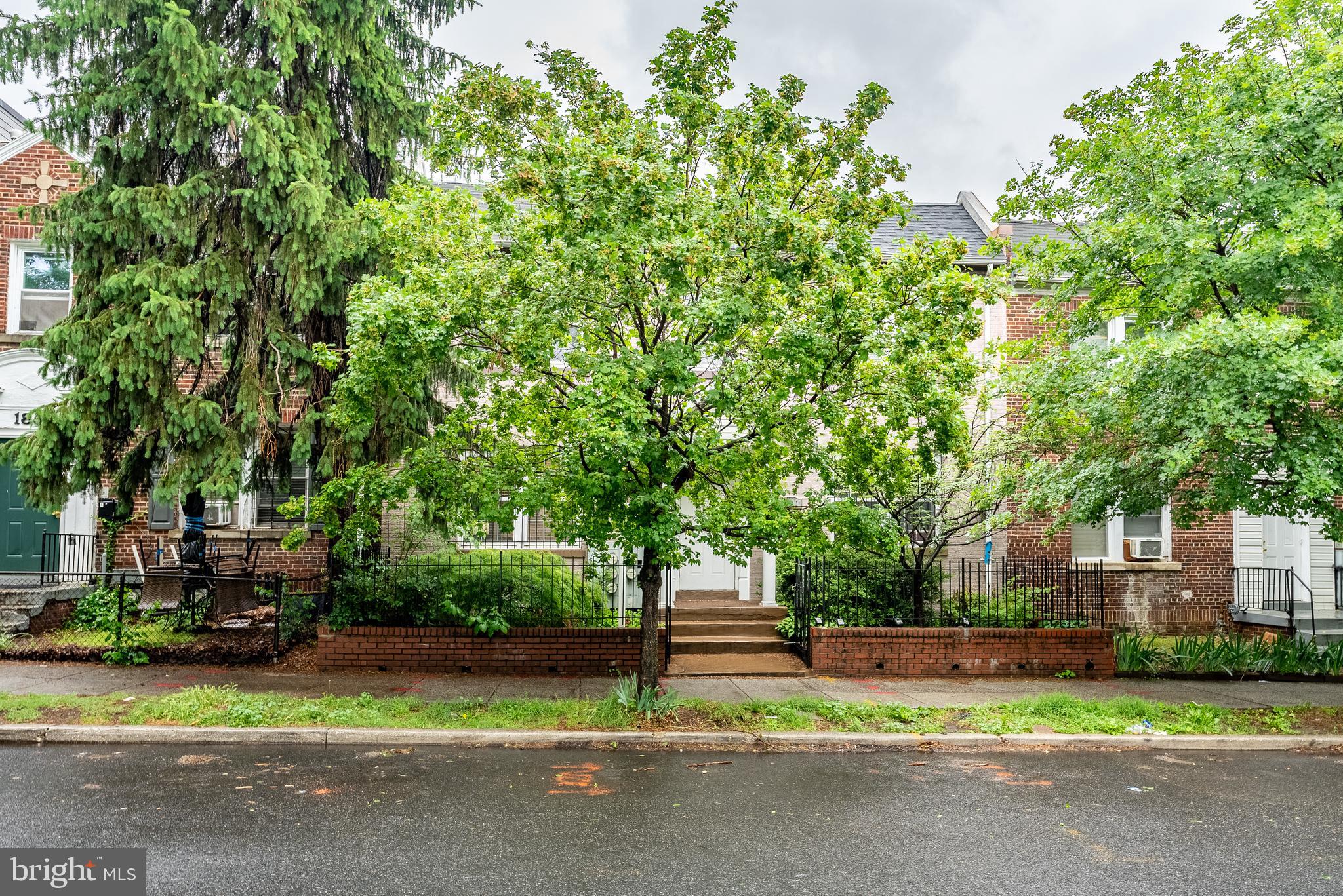 1840 D Street Northeast, Unit 1 Washington, DC 20002 - Photo 40 of 40 a green field with trees in the background