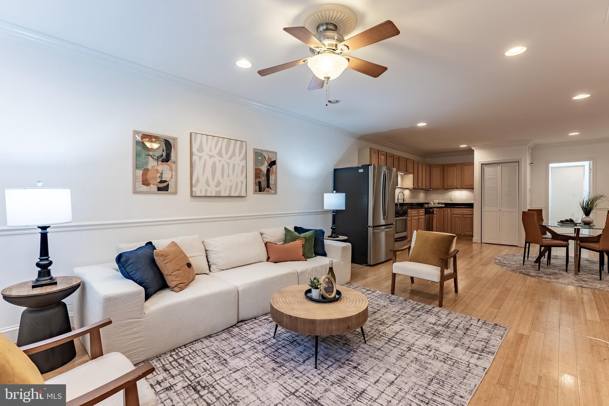 1840 D Street Northeast, Unit 1 Washington, DC 20002 - Photo 6 of 40 a living room with furniture and a wooden floor