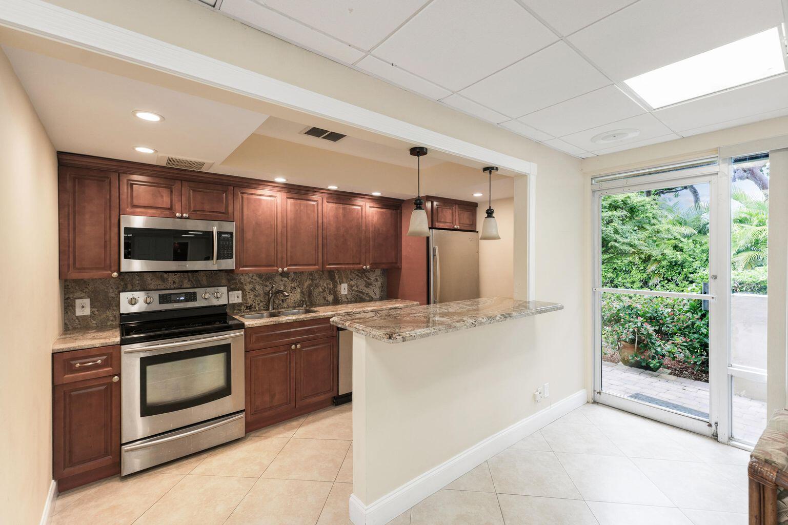 1111 South Ocean Boulevard, Unit 317 Boca Raton, FL 33432 - Photo 39 of 46 Club Kitchen