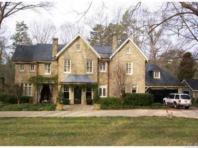 809 Rosemont Avenue Raleigh, NC 27607 - Photo 1 of 1 a front view of a house with a yard