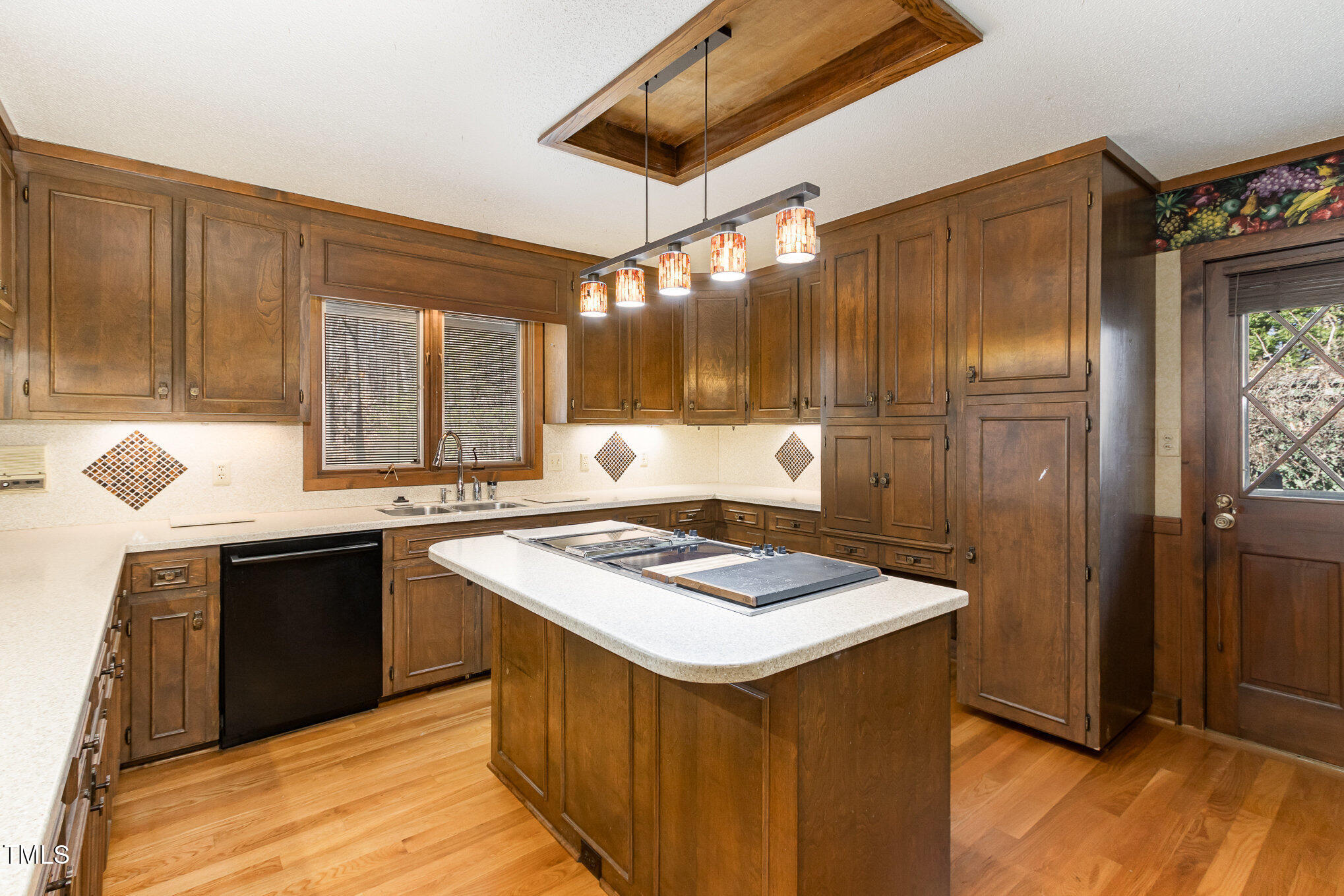 3514 Ridge Road Durham, NC 27705 - Photo 16 of 38 a kitchen that has a sink and a stove in it