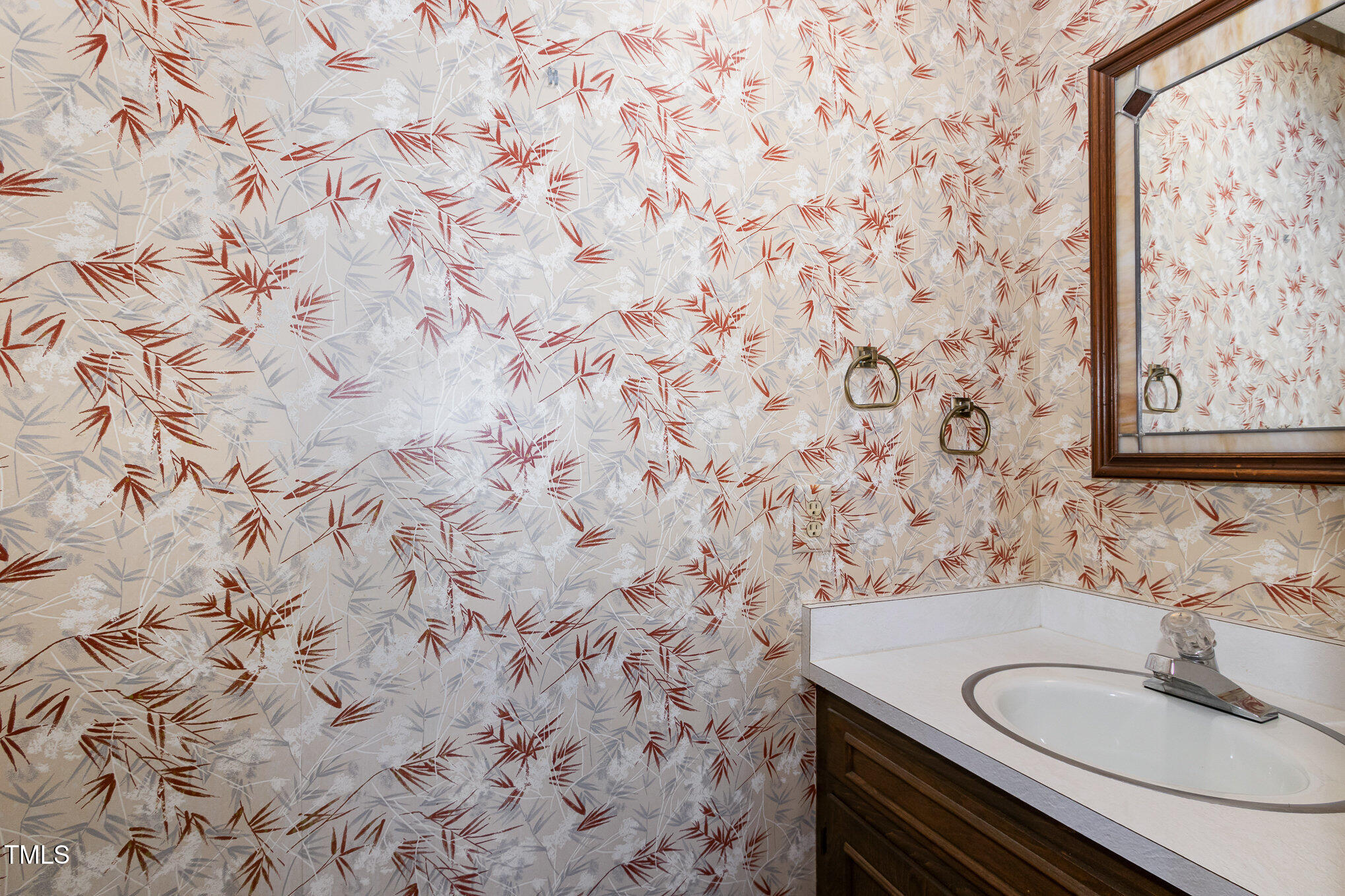 3514 Ridge Road Durham, NC 27705 - Photo 20 of 38 a bathroom with a granite countertop sink and a mirror