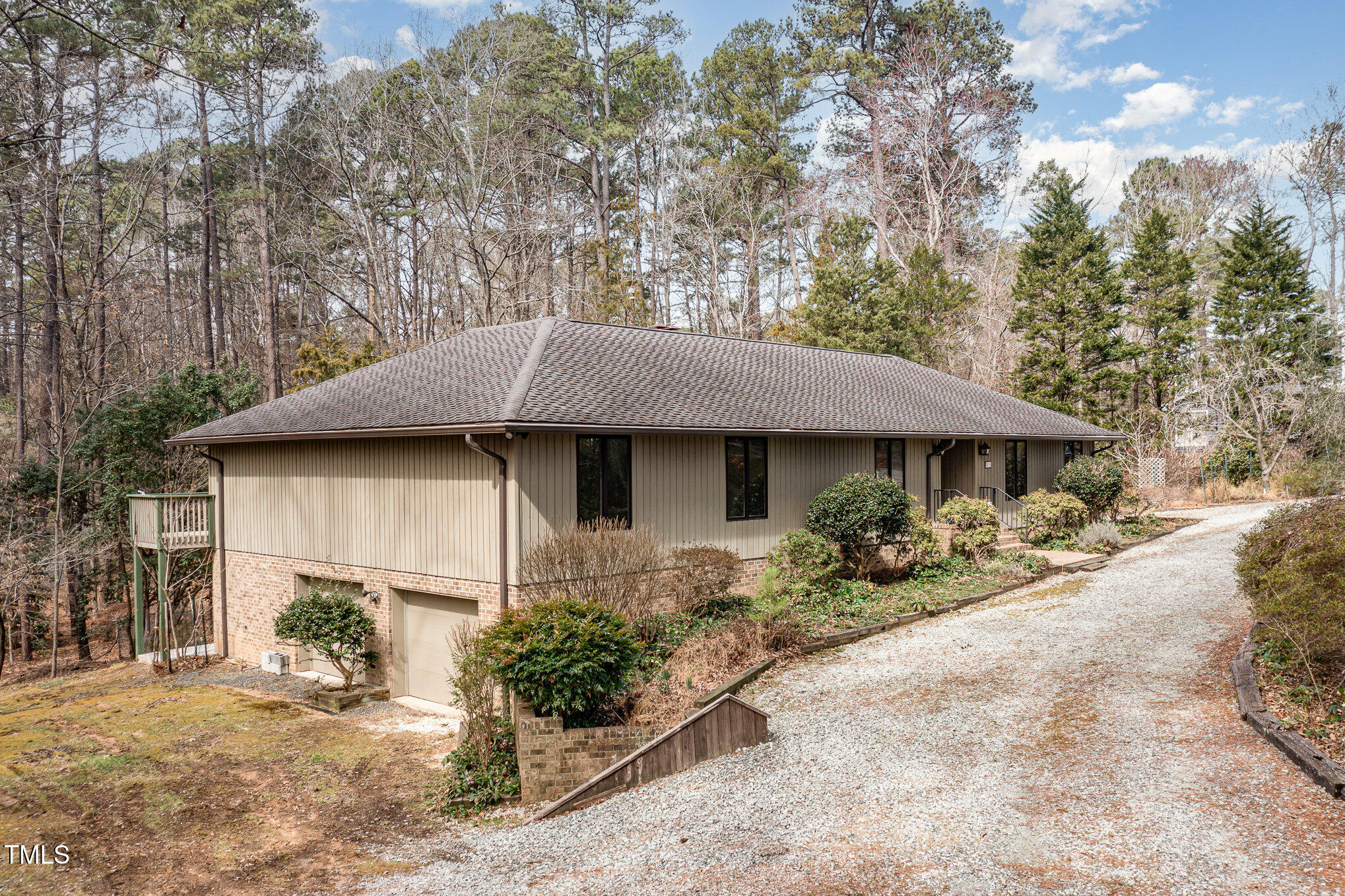 3514 Ridge Road Durham, NC 27705 - Photo 2 of 38 a front view of a house with a yard and garage