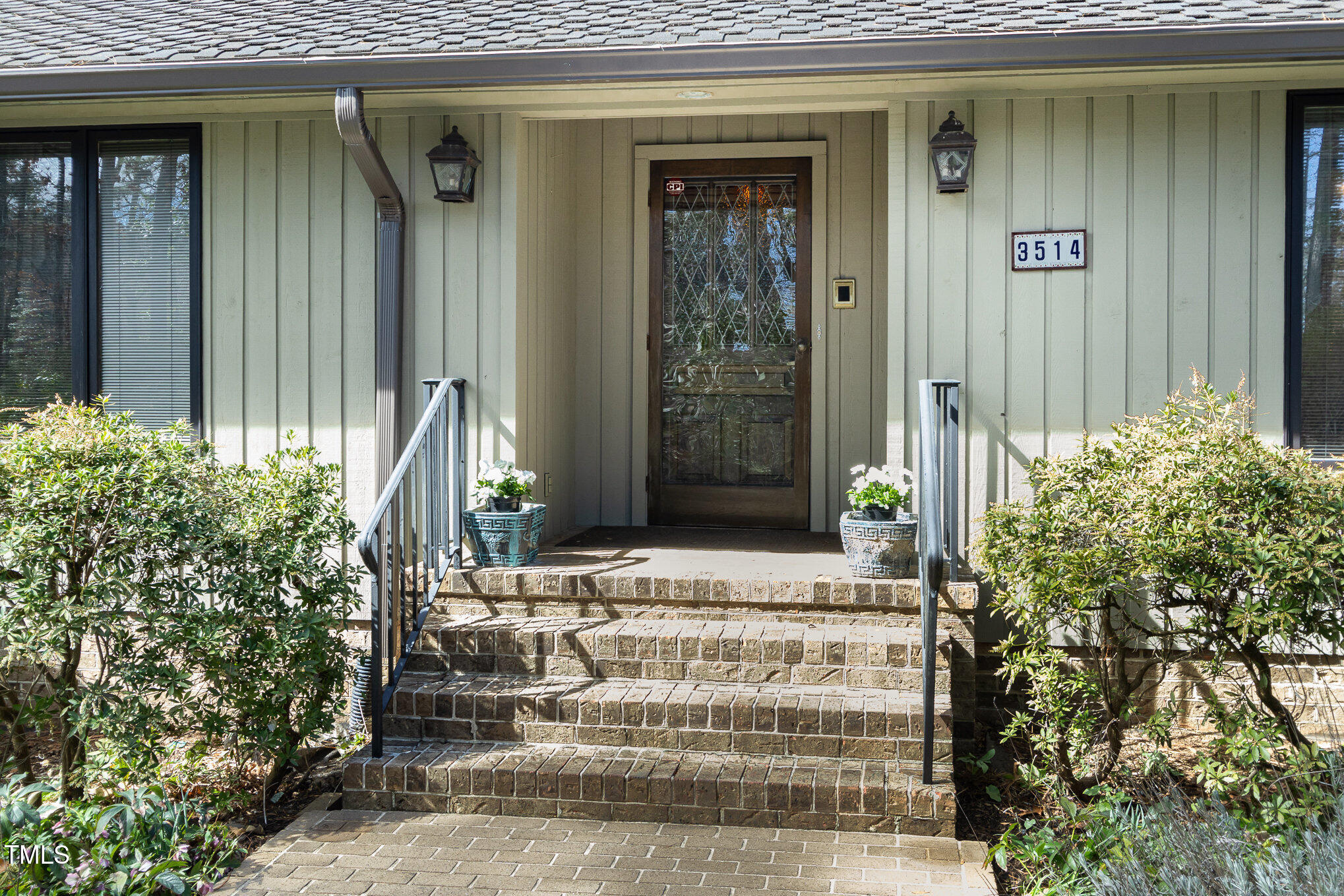 3514 Ridge Road Durham, NC 27705 - Photo 5 of 38 a front view of a house with a yard